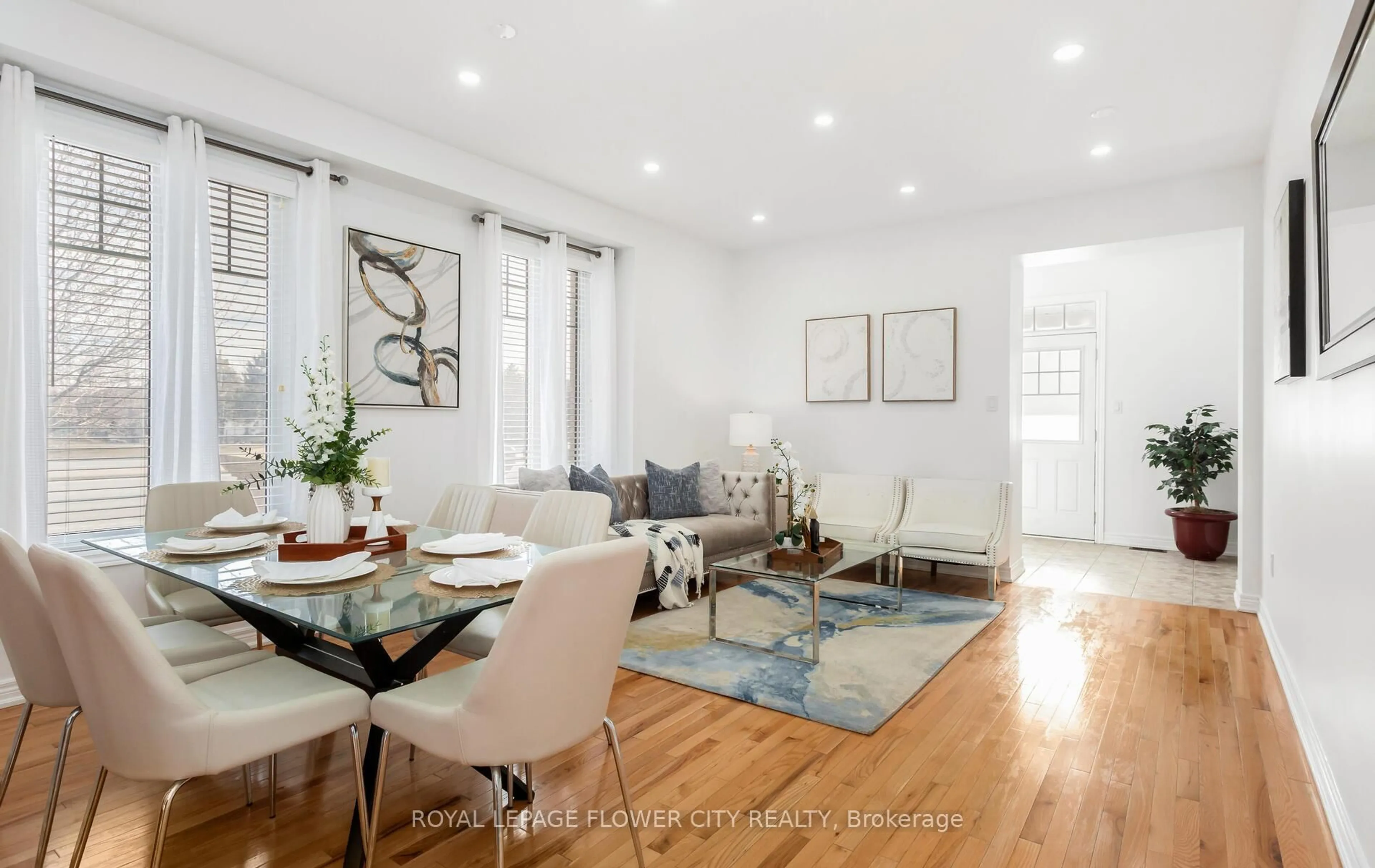 Living room with furniture, wood/laminate floor for 2 Archville St, Brampton Ontario L6Y 5Y5