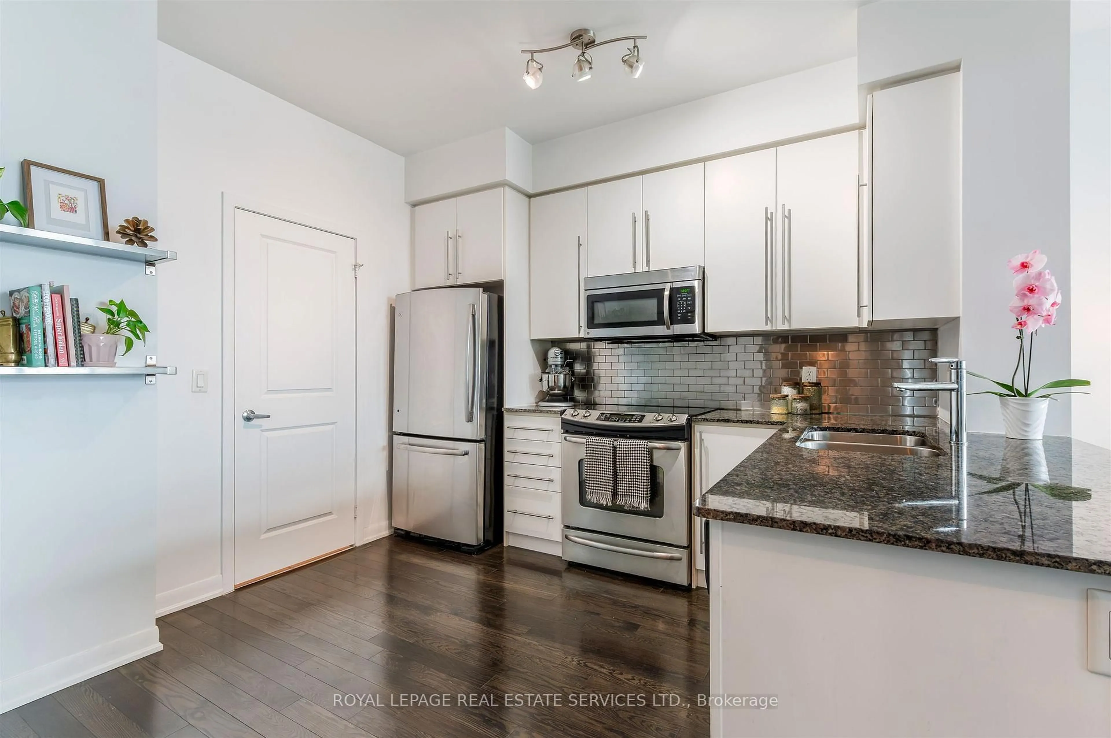Standard kitchen, wood/laminate floor for 215 Sherway Gardens Rd #PH101, Toronto Ontario M9C 0A4