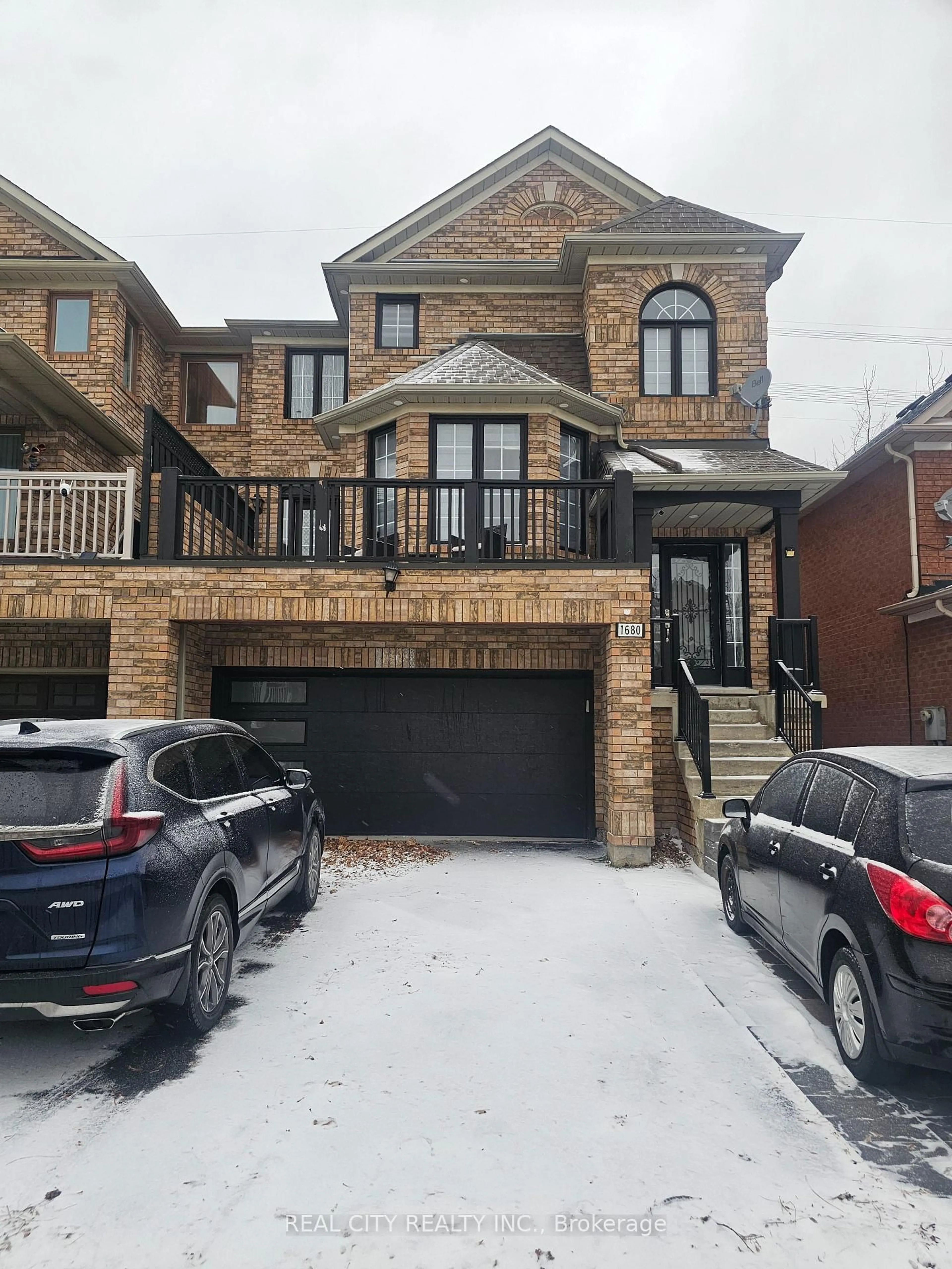 Home with brick exterior material, street for 1680 Samuelson Circ, Mississauga Ontario L5N 7Z7