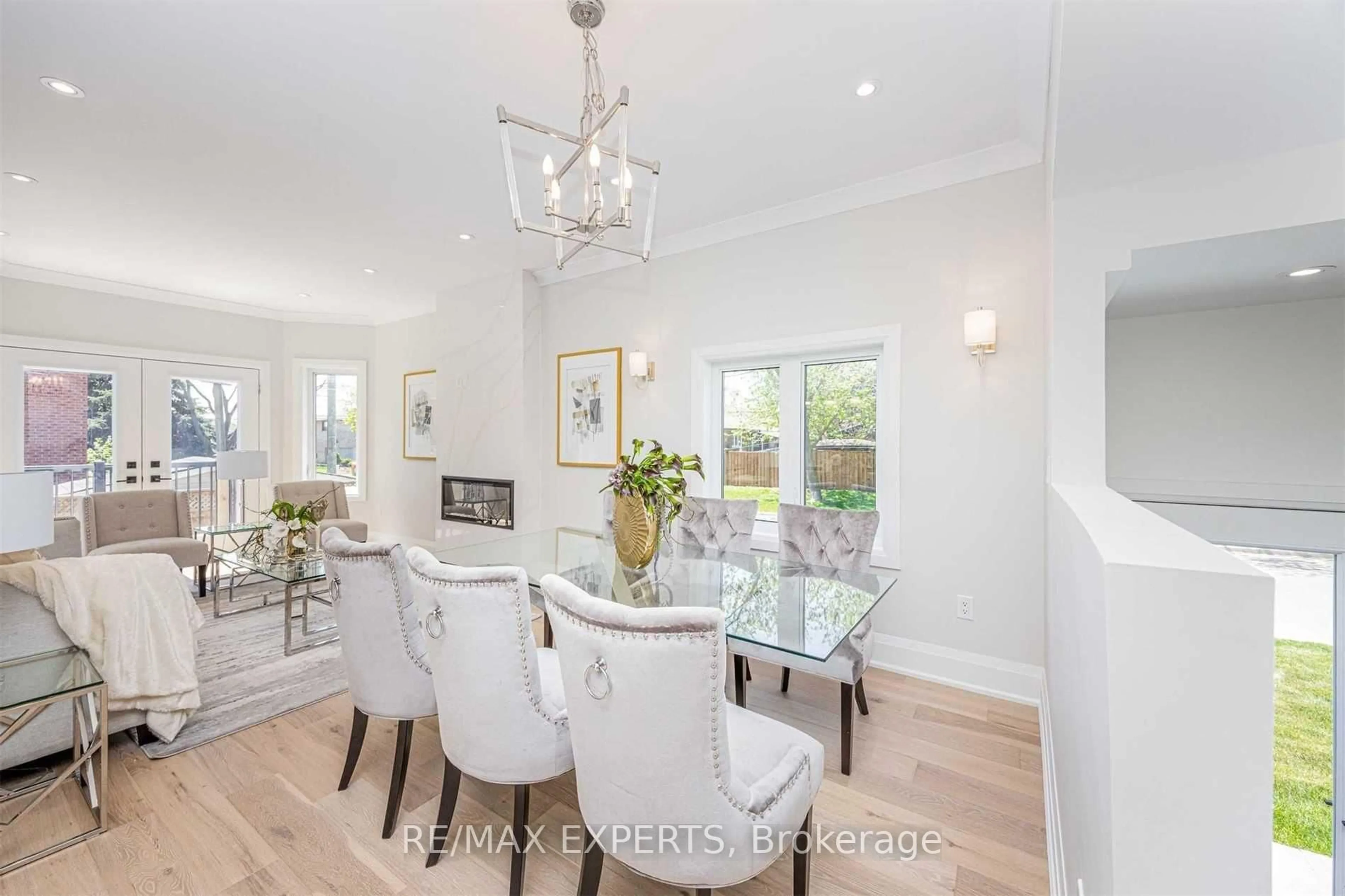 Dining room, wood/laminate floor for 55 Muir Ave, Toronto Ontario M9L 1H5