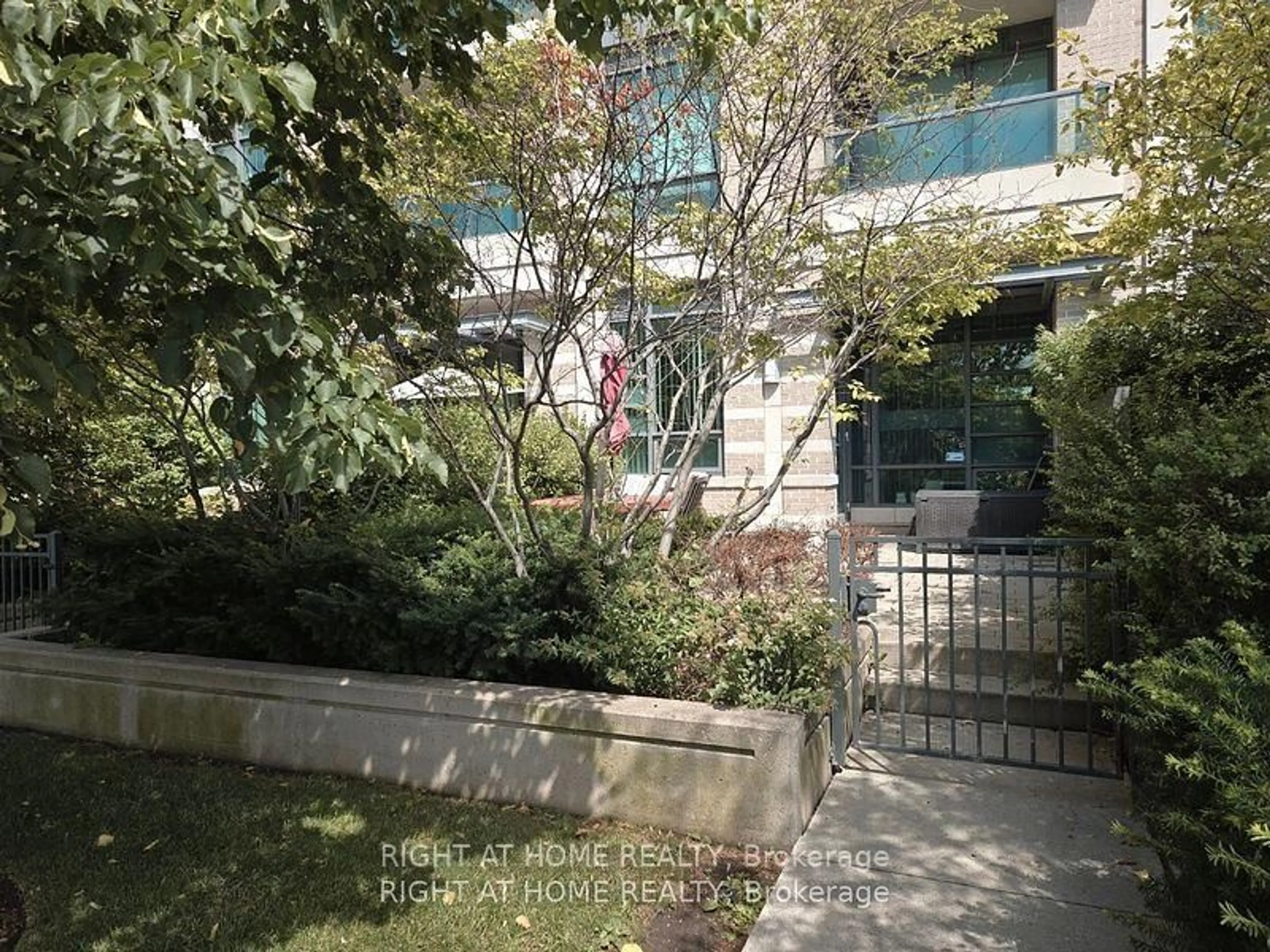 A pic from outside/outdoor area/front of a property/back of a property/a pic from drone, street for 215 Sherway Gardens Rd #101, Toronto Ontario M9C 0A4