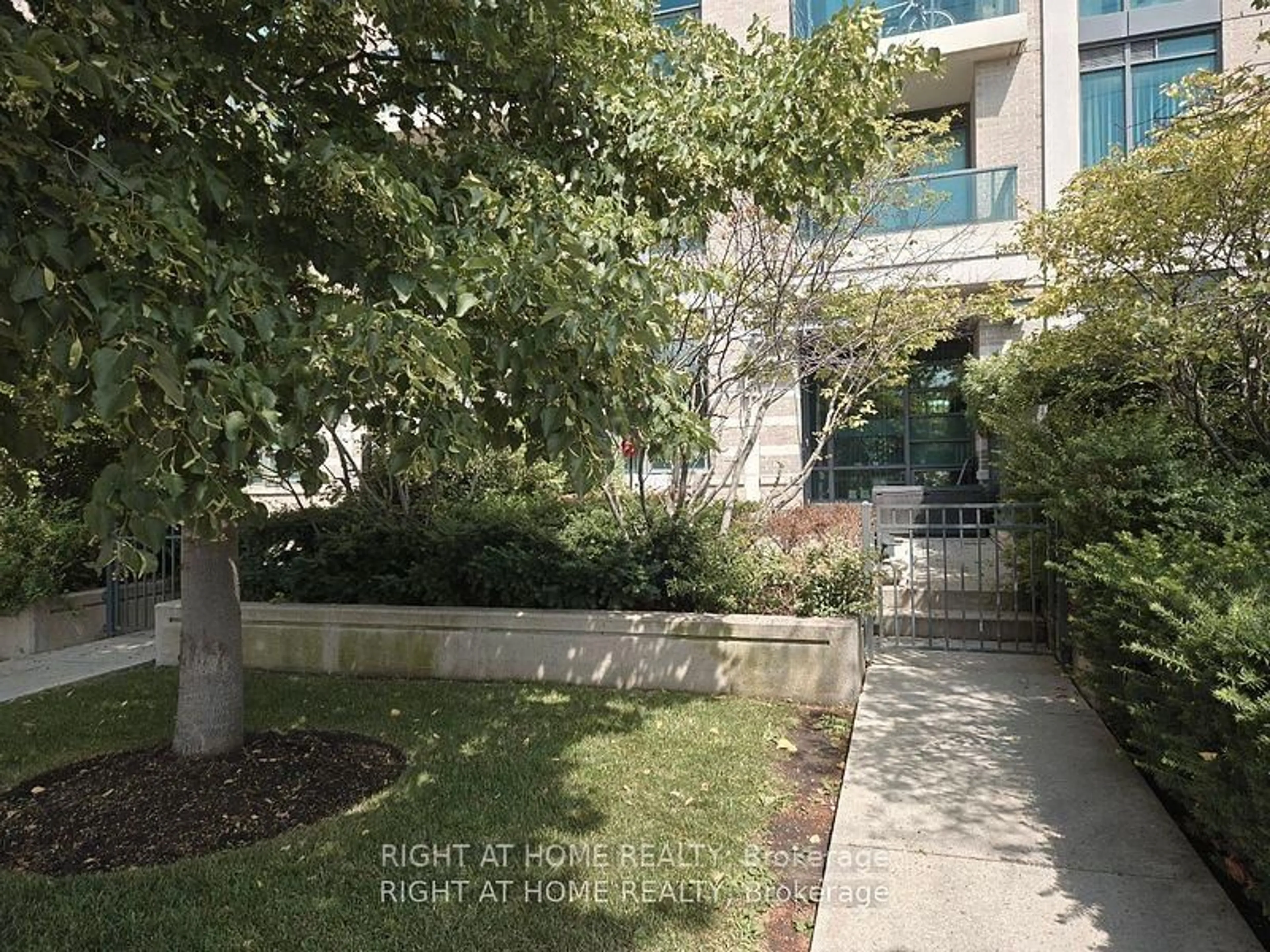 A pic from outside/outdoor area/front of a property/back of a property/a pic from drone, street for 215 Sherway Gardens Rd #101, Toronto Ontario M9C 0A4