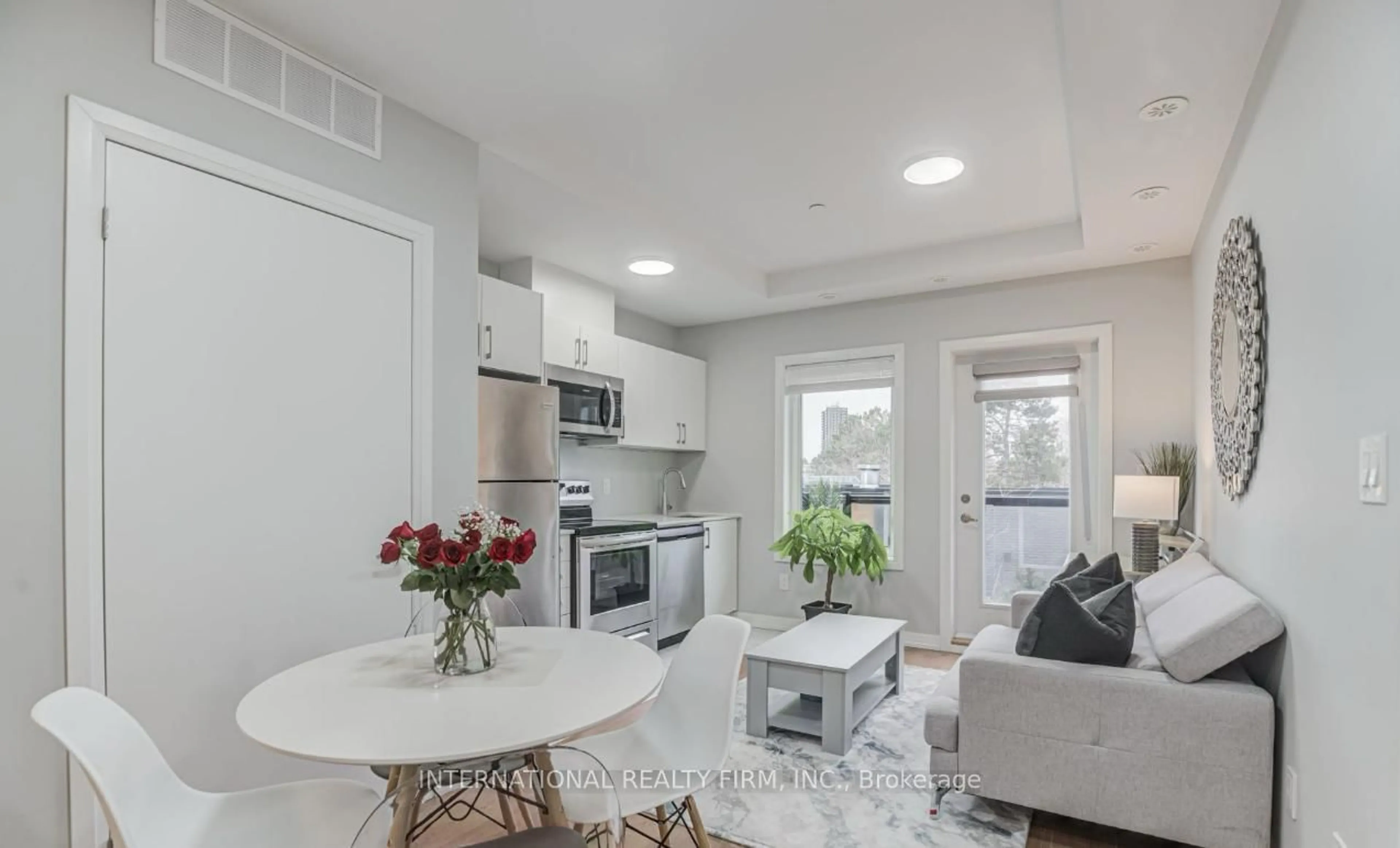 Open concept kitchen, ceramic/tile floor for 402 The East Mall #213, Toronto Ontario M9B 3Z9