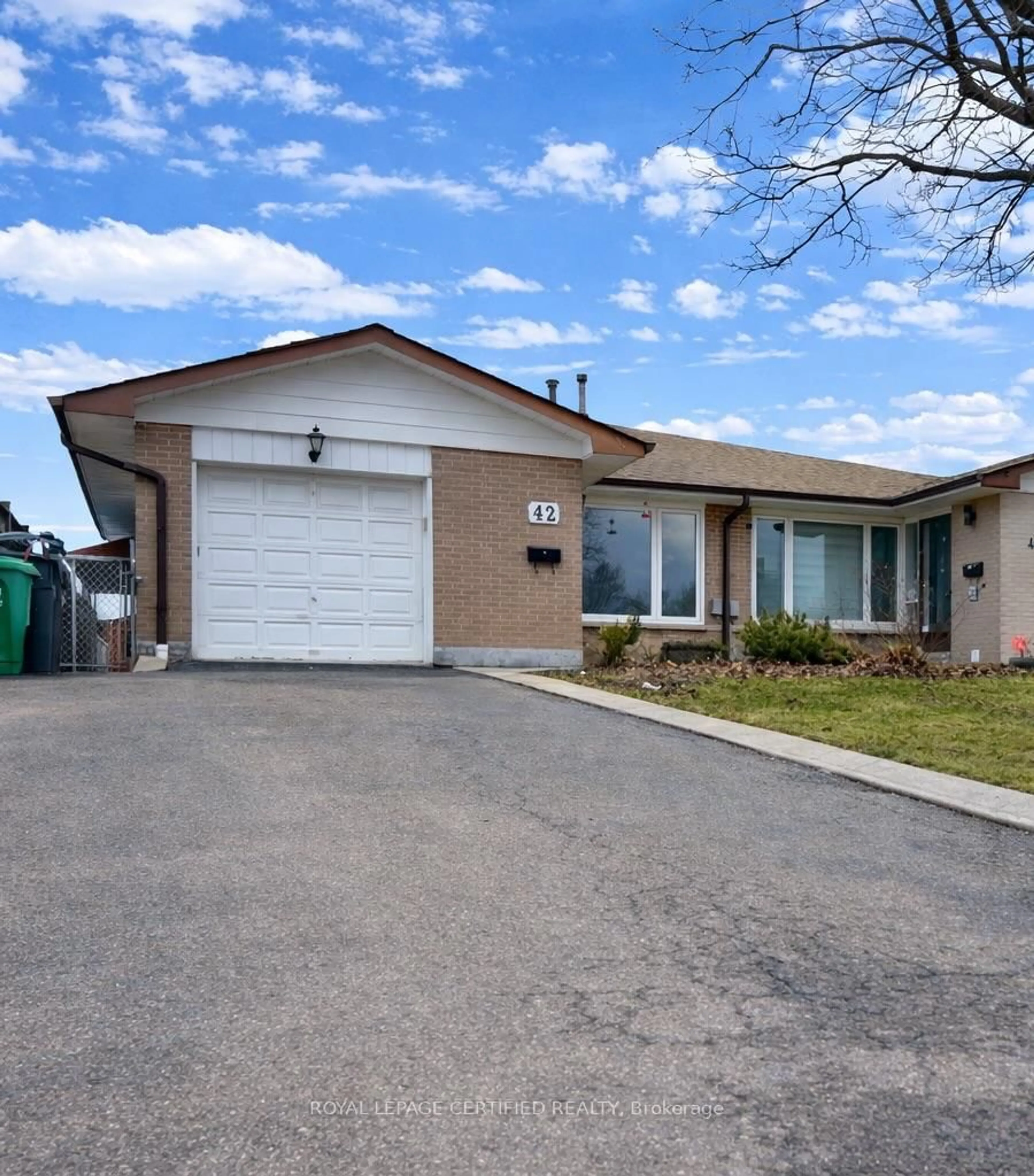 Home with vinyl exterior material, street for 42 Wilton Dr, Brampton Ontario L6W 3A1