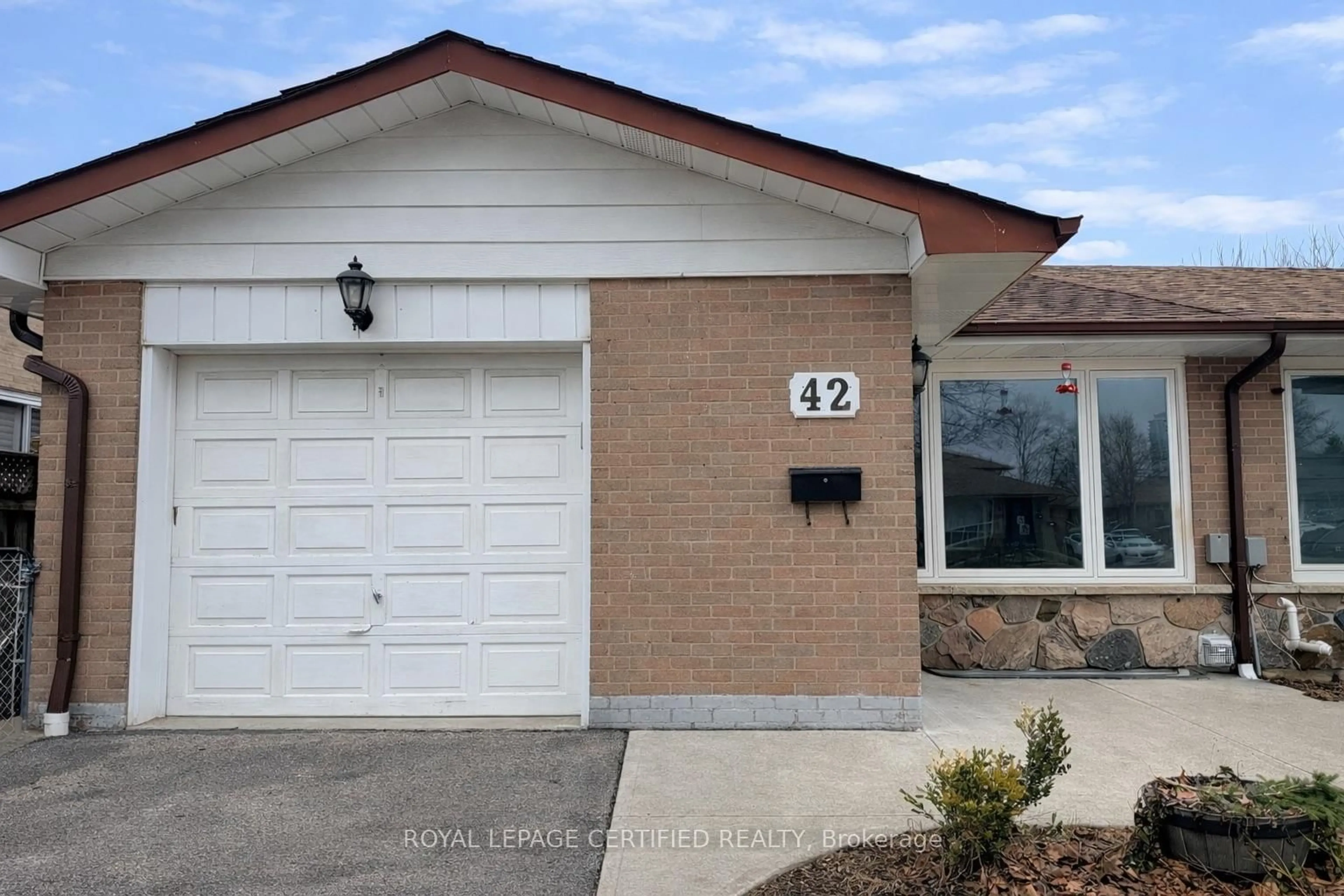 Home with brick exterior material, street for 42 Wilton Dr, Brampton Ontario L6W 3A1