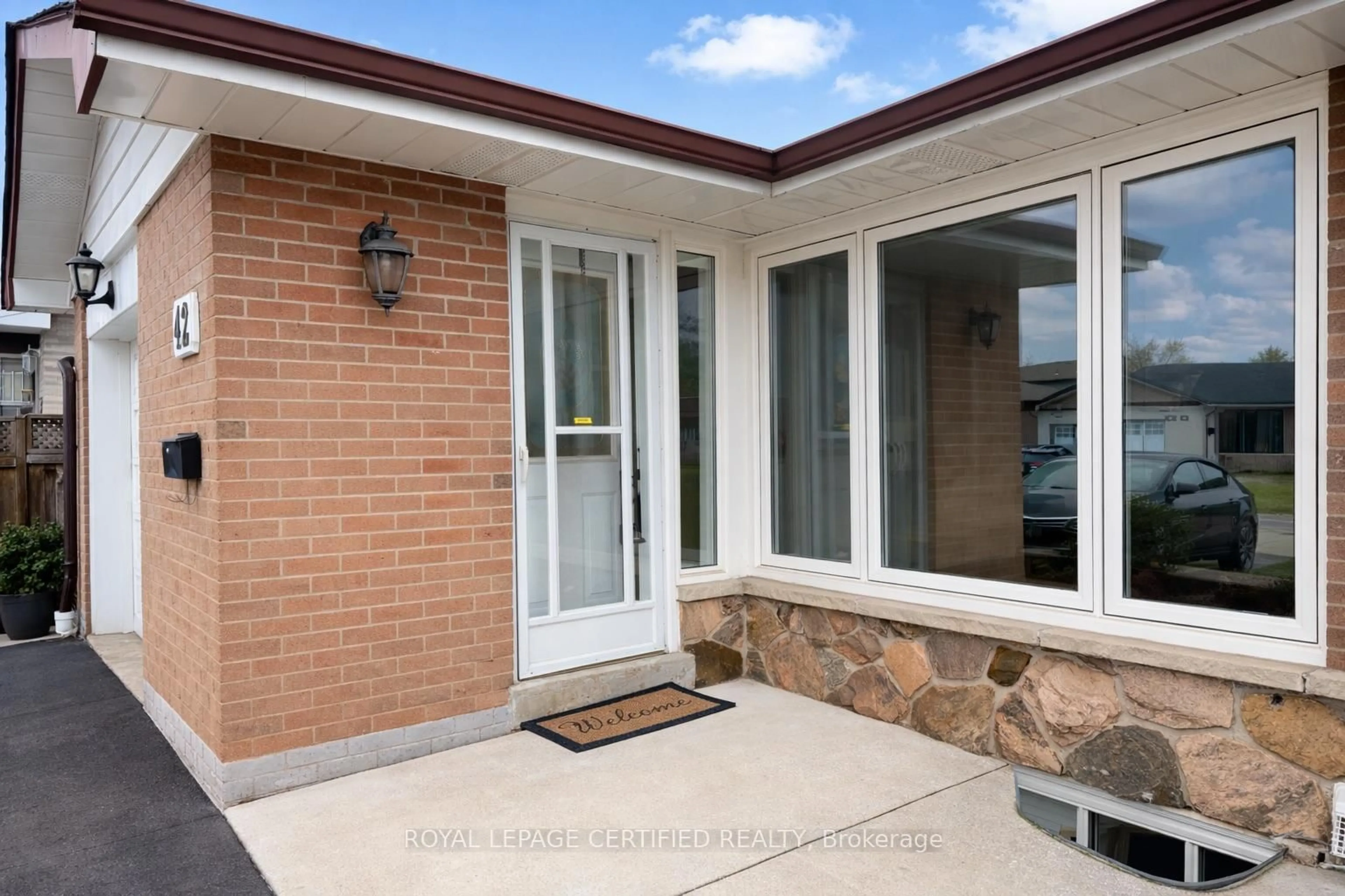 Home with brick exterior material, street for 42 Wilton Dr, Brampton Ontario L6W 3A1