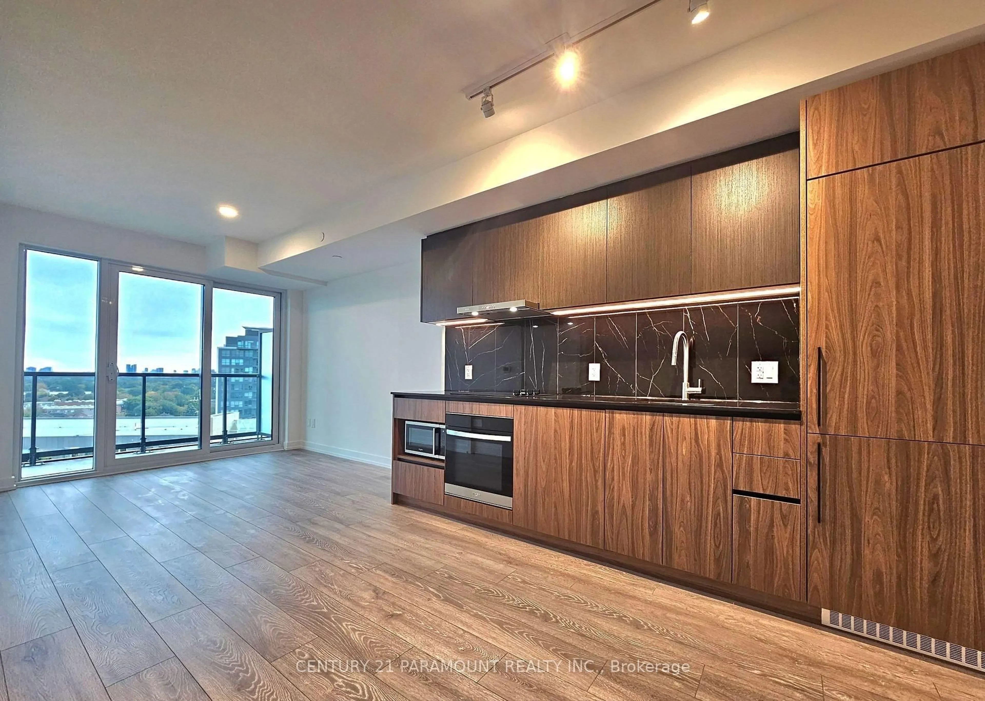 Open concept kitchen, wood/laminate floor for 1100 Sheppard Ave #1137, Toronto Ontario M3K 0E4