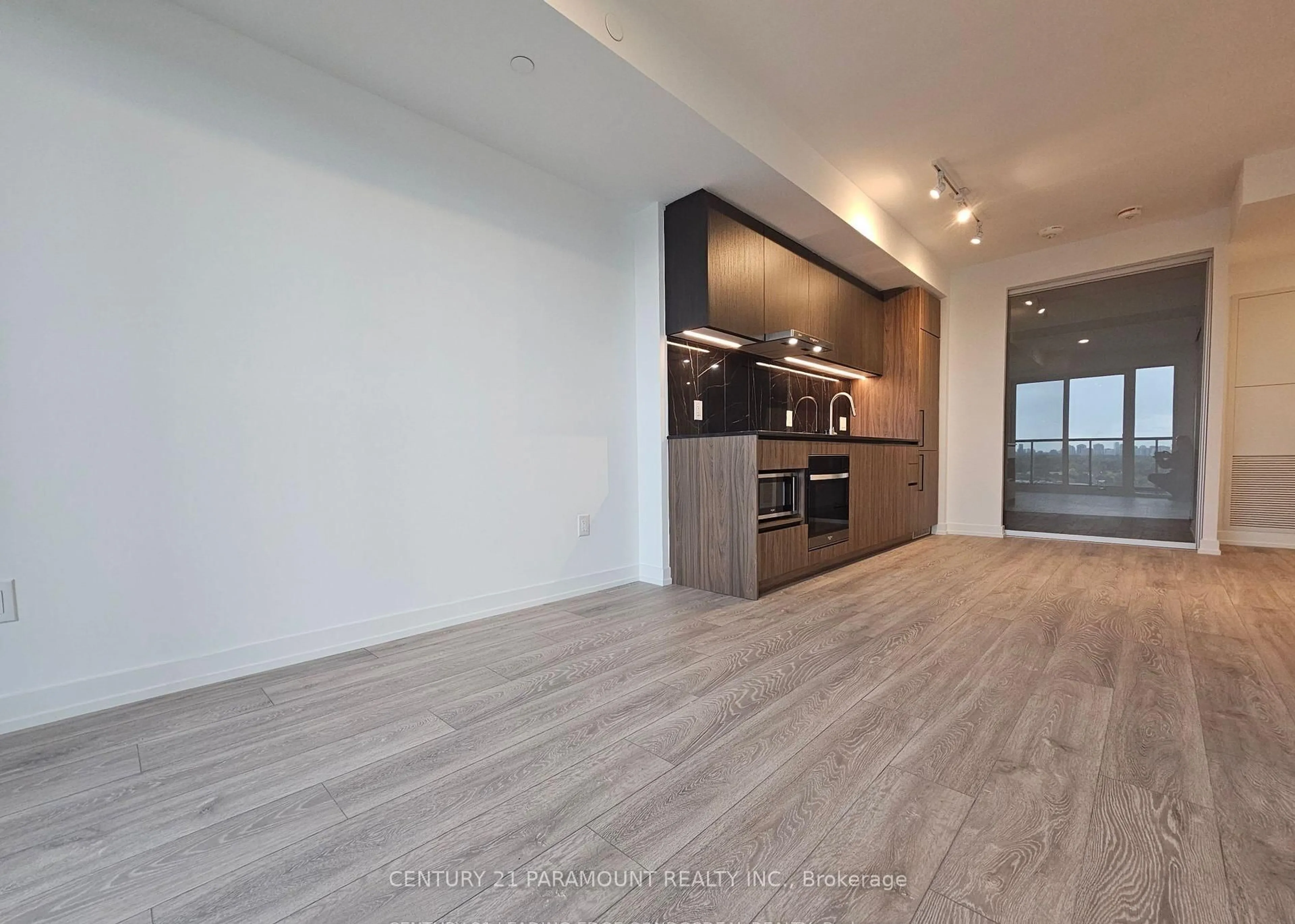 Open concept kitchen, wood/laminate floor for 1100 Sheppard Ave #1137, Toronto Ontario M3K 0E4