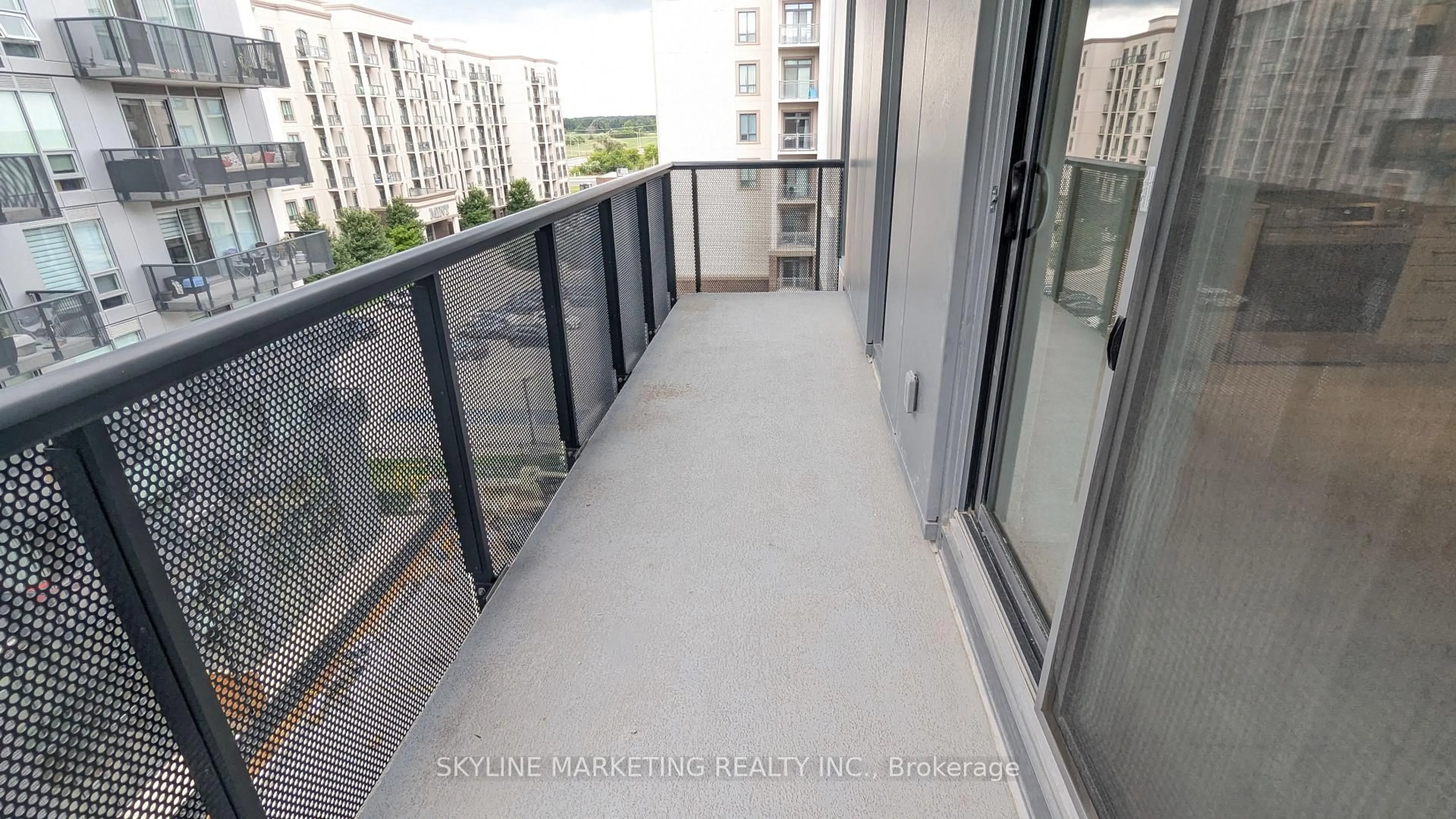Balcony in the apartment, city buildings view from balcony for 2450 Old Bronte Rd #504, Oakville Ontario L6M 5P6