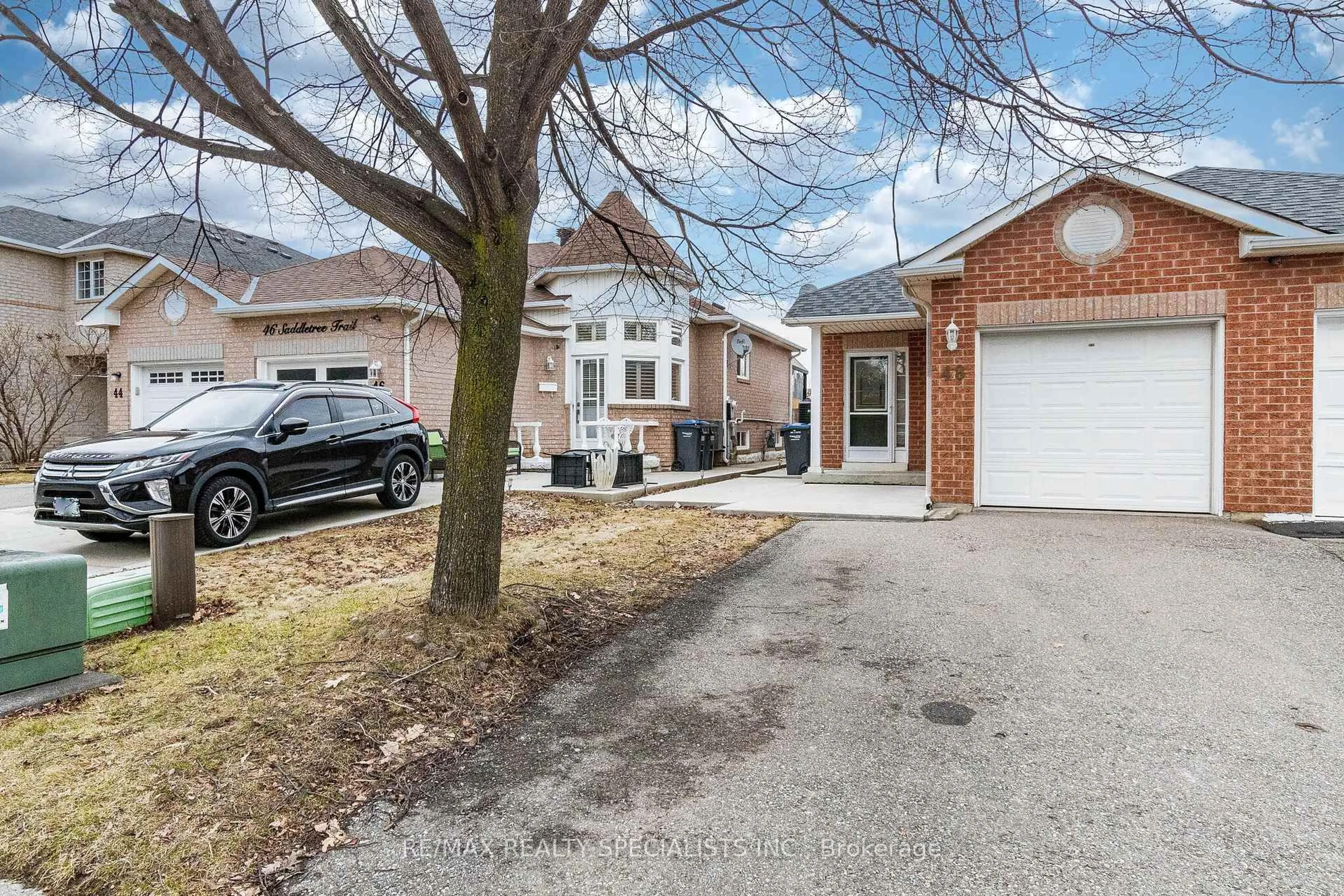 Home with brick exterior material, street for 48 Saddletree Tr, Brampton Ontario L6X 4M7