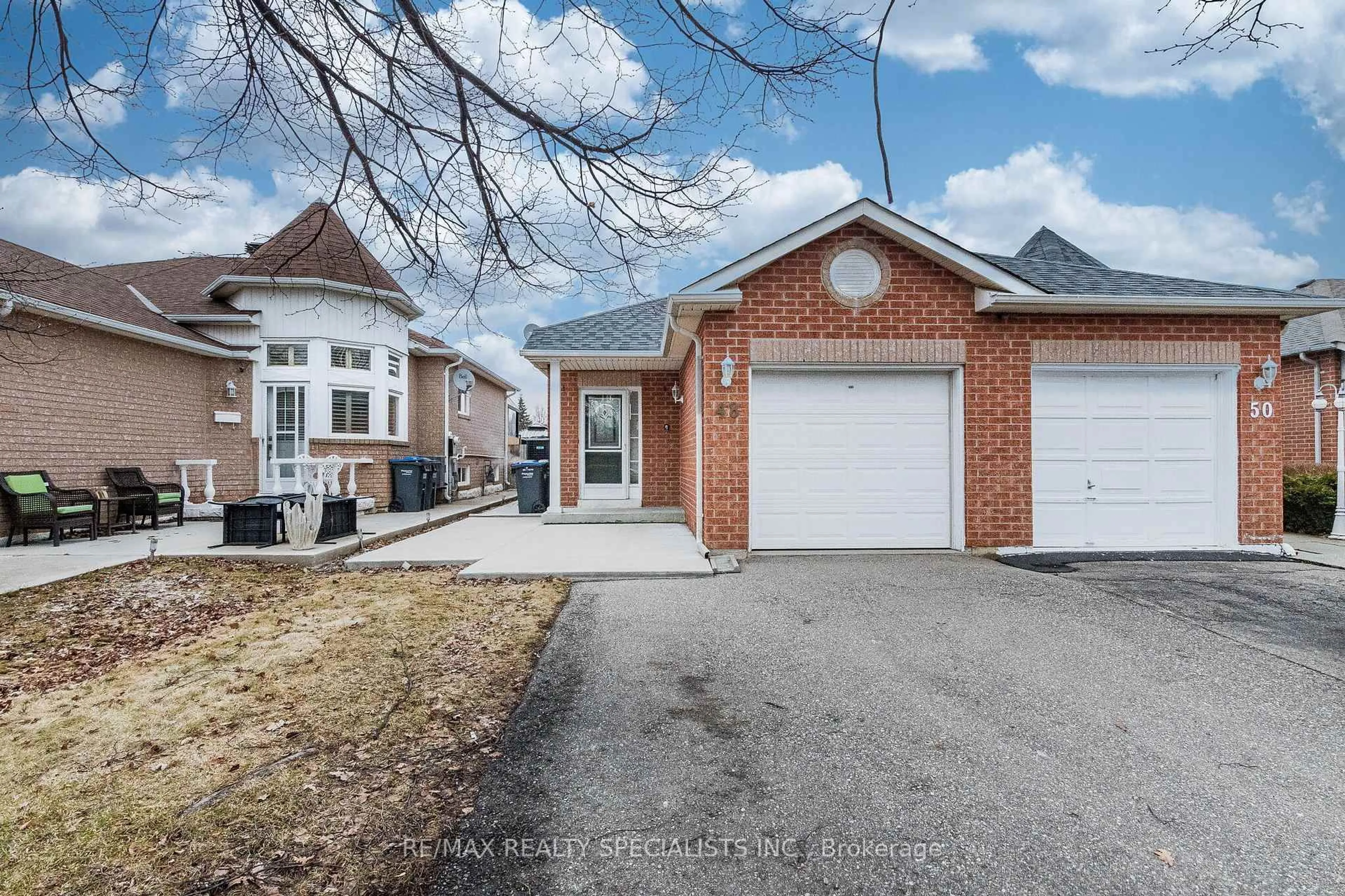 Home with brick exterior material, street for 48 Saddletree Tr, Brampton Ontario L6X 4M7