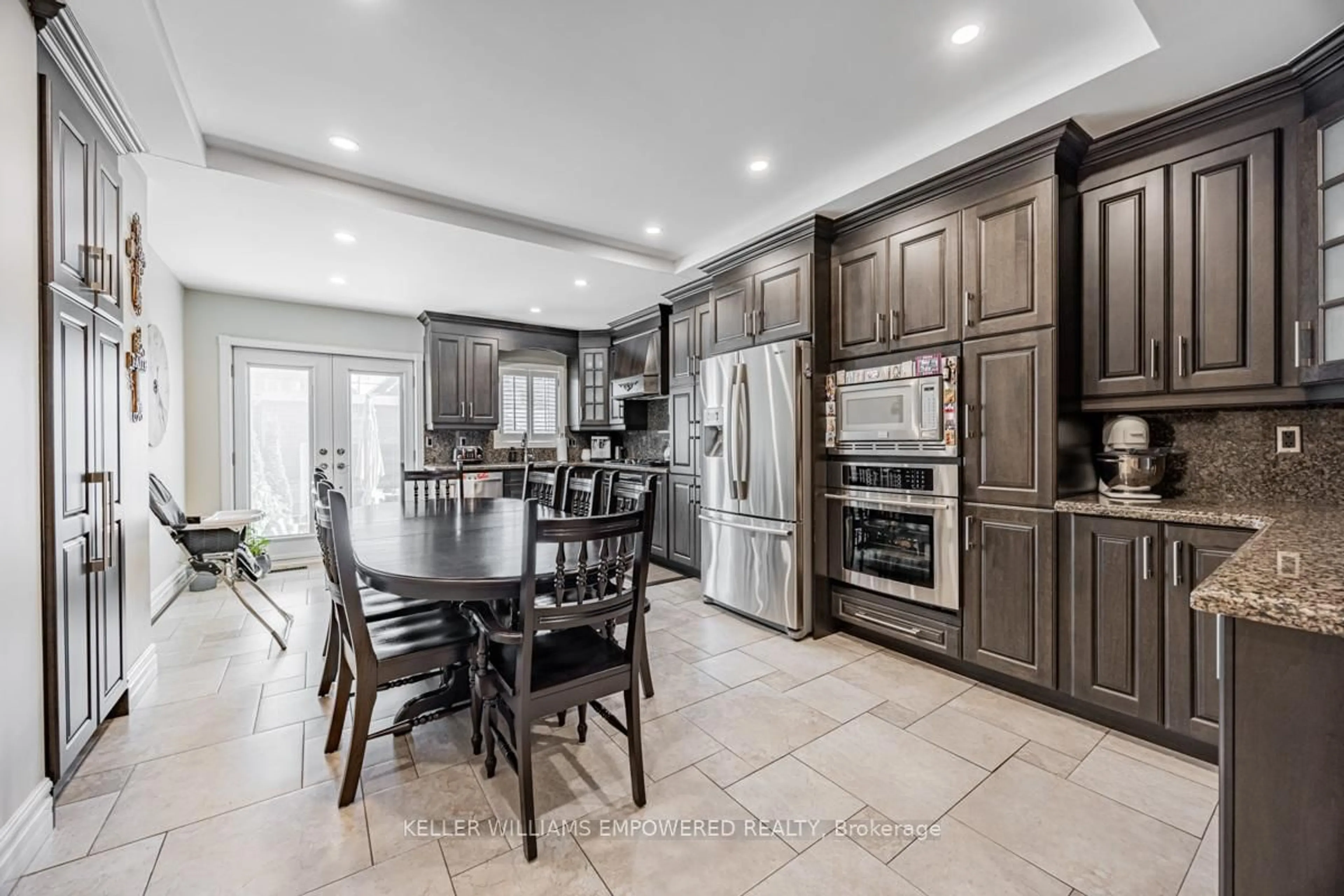 Open concept kitchen, ceramic/tile floor for 7 Goodwood Ave, Toronto Ontario M6E 1J1