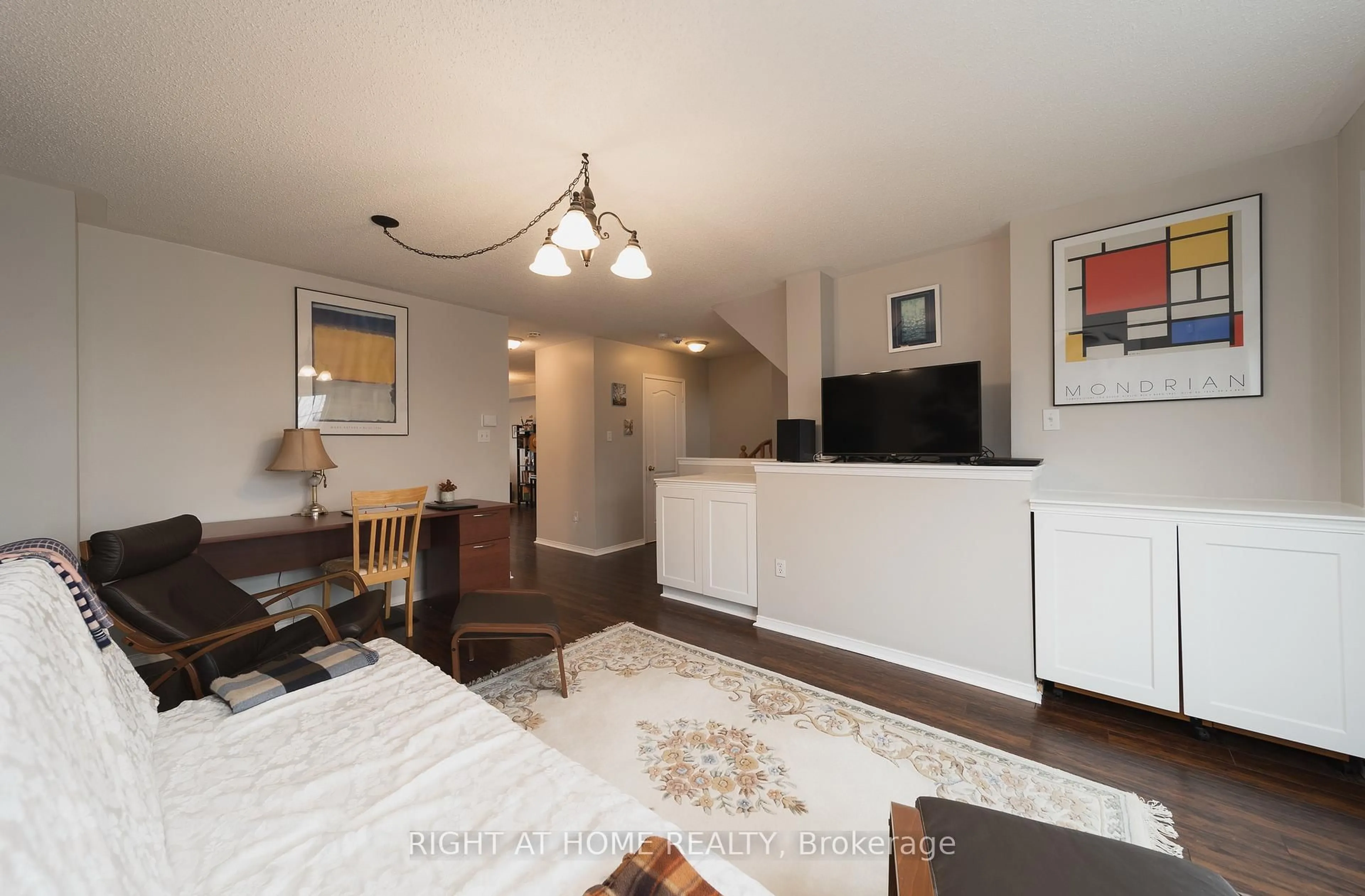 Living room with furniture, wood/laminate floor for 1251 Lamont Cres, Milton Ontario L9T 6W4