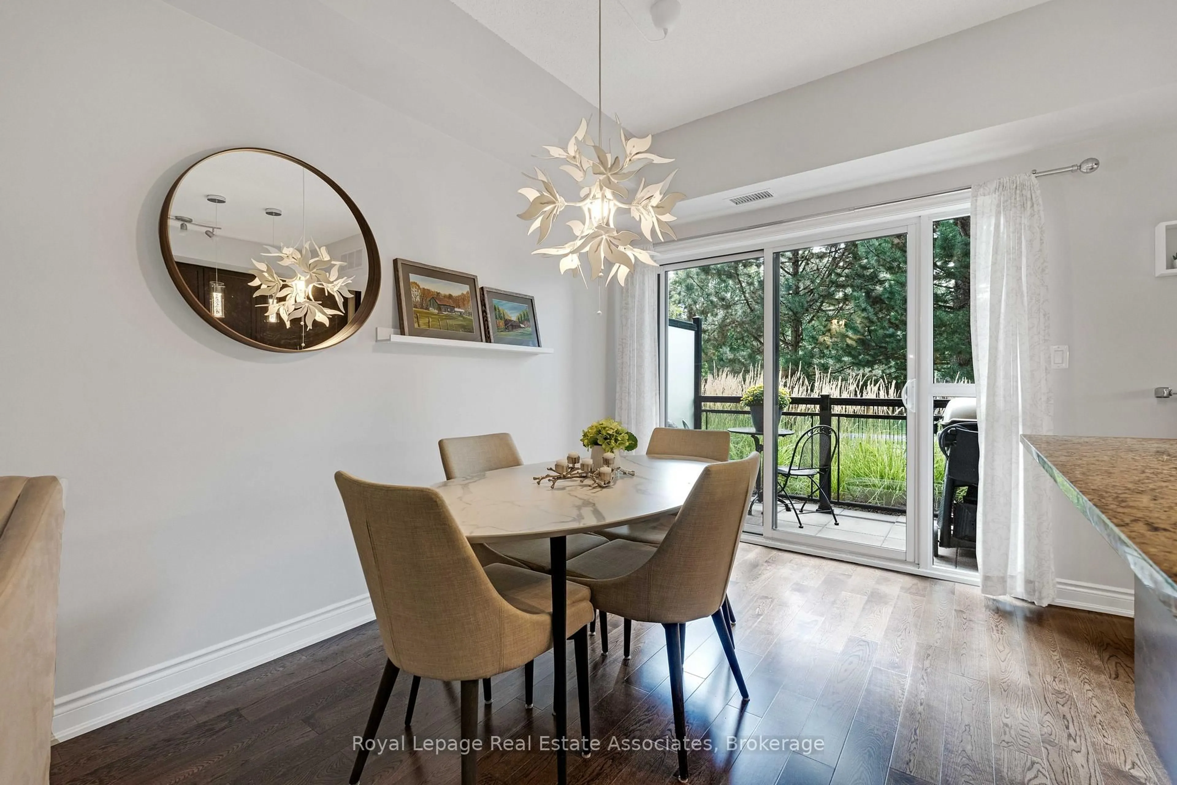 Dining room, wood/laminate floor for 3170 Erin Mills Pkwy #108, Mississauga Ontario L5L 0B6