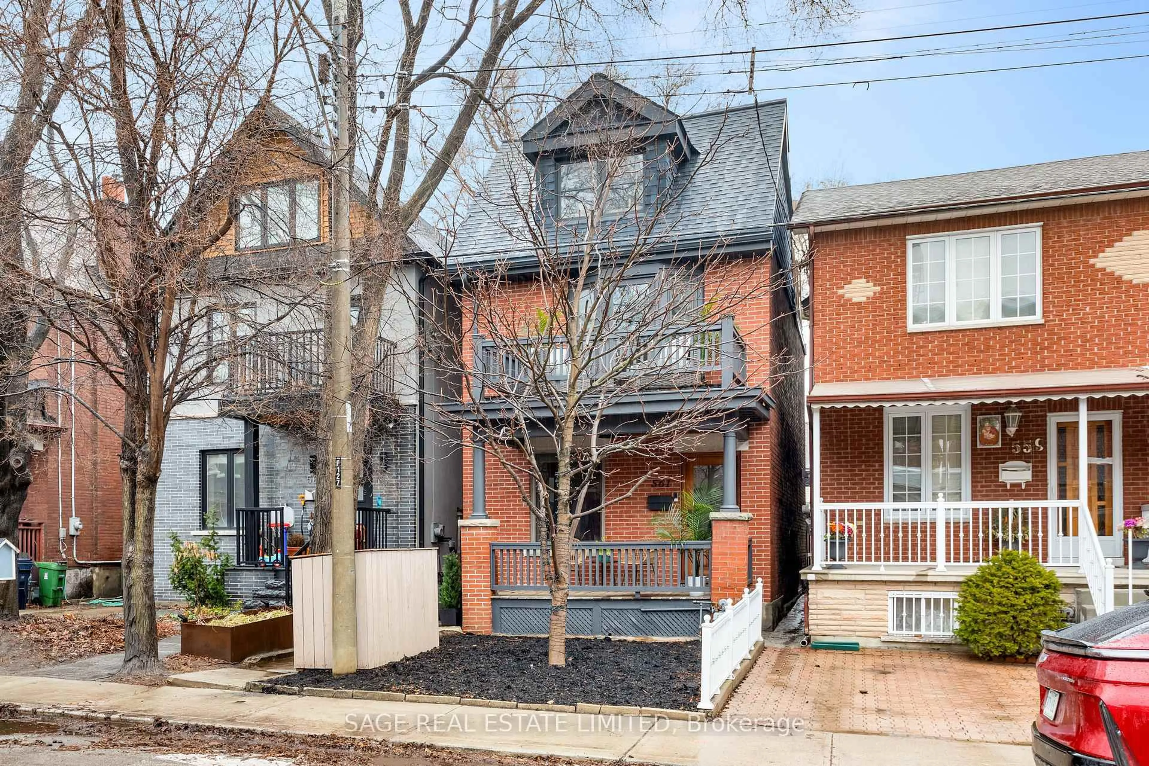 Home with brick exterior material, street for 561 St Clarens Ave, Toronto Ontario M6H 3W6