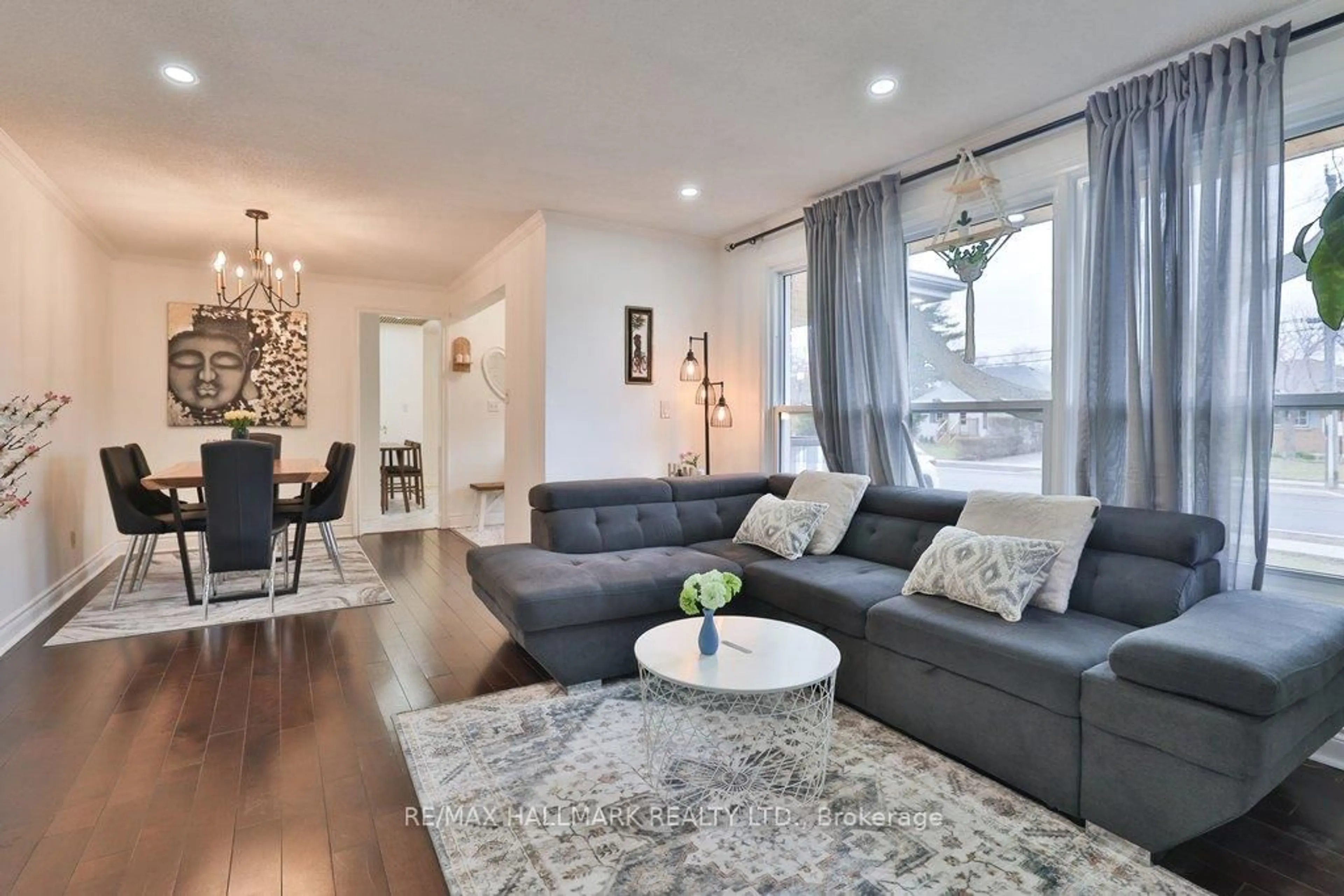 Living room with furniture, wood/laminate floor for 2334 Prospect St, Burlington Ontario L7R 2A6