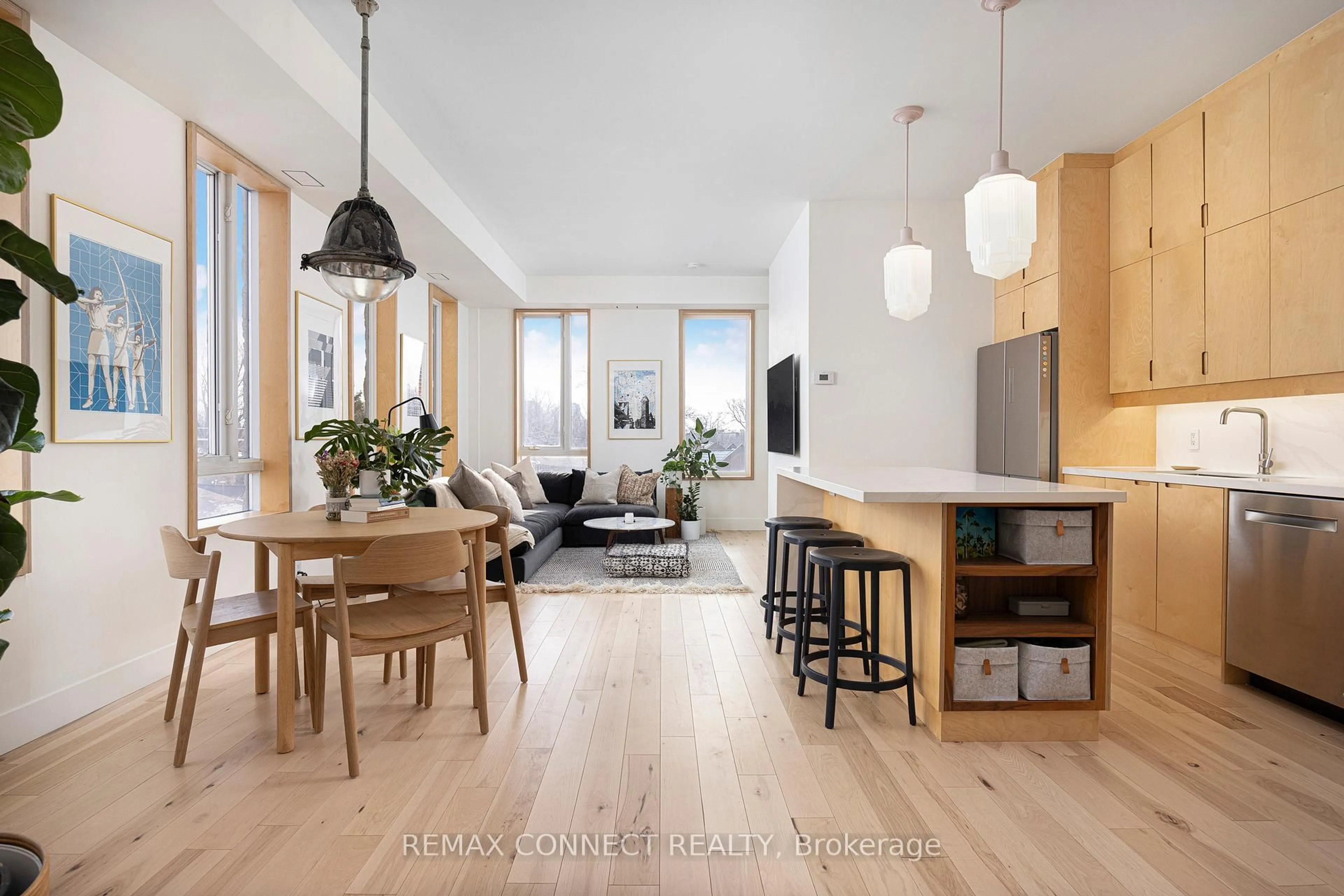 Open concept kitchen, wood/laminate floor for 1 St Johns Rd #402, Toronto Ontario M6P 1T7