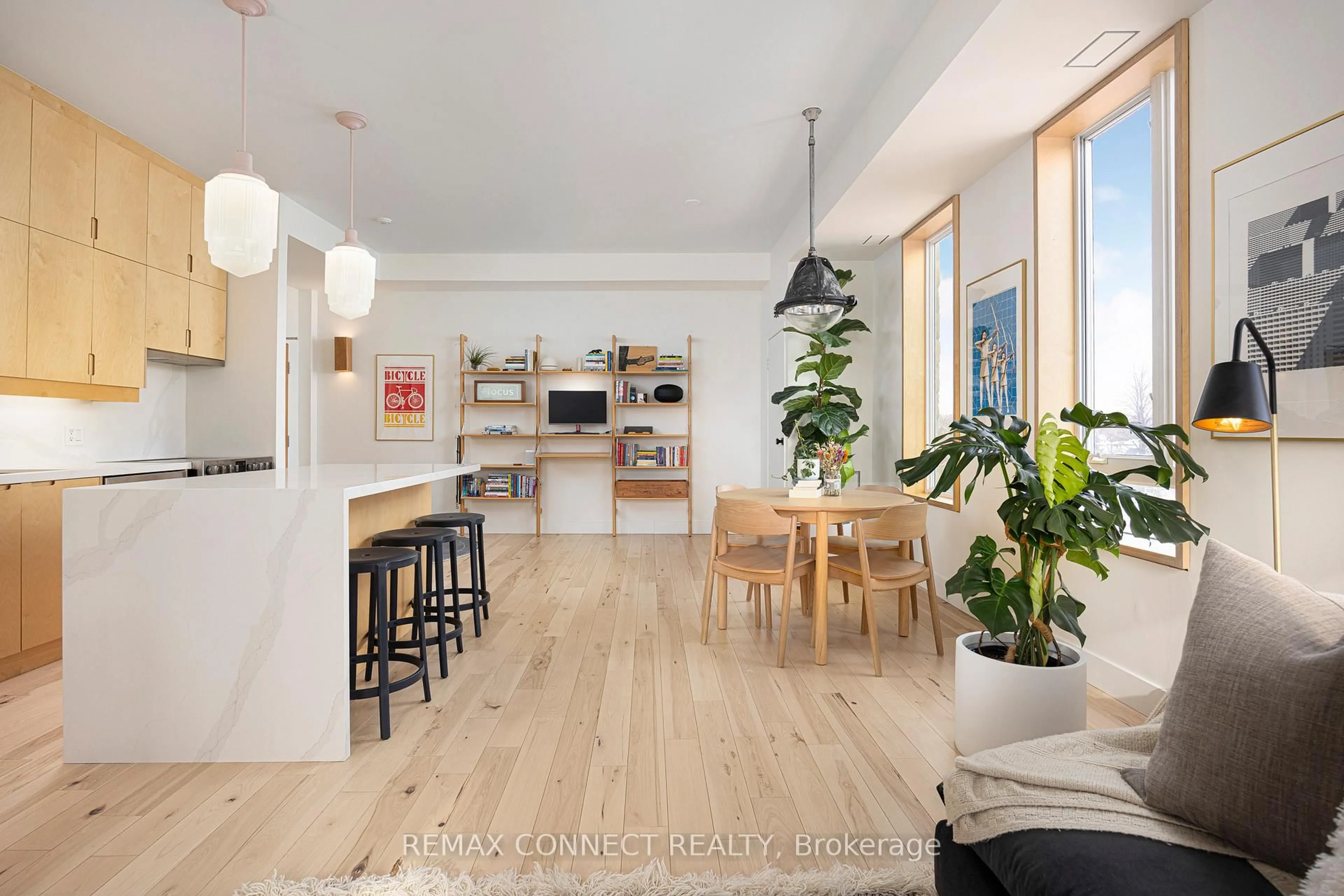 Open concept kitchen, wood/laminate floor for 1 St Johns Rd #402, Toronto Ontario M6P 1T7