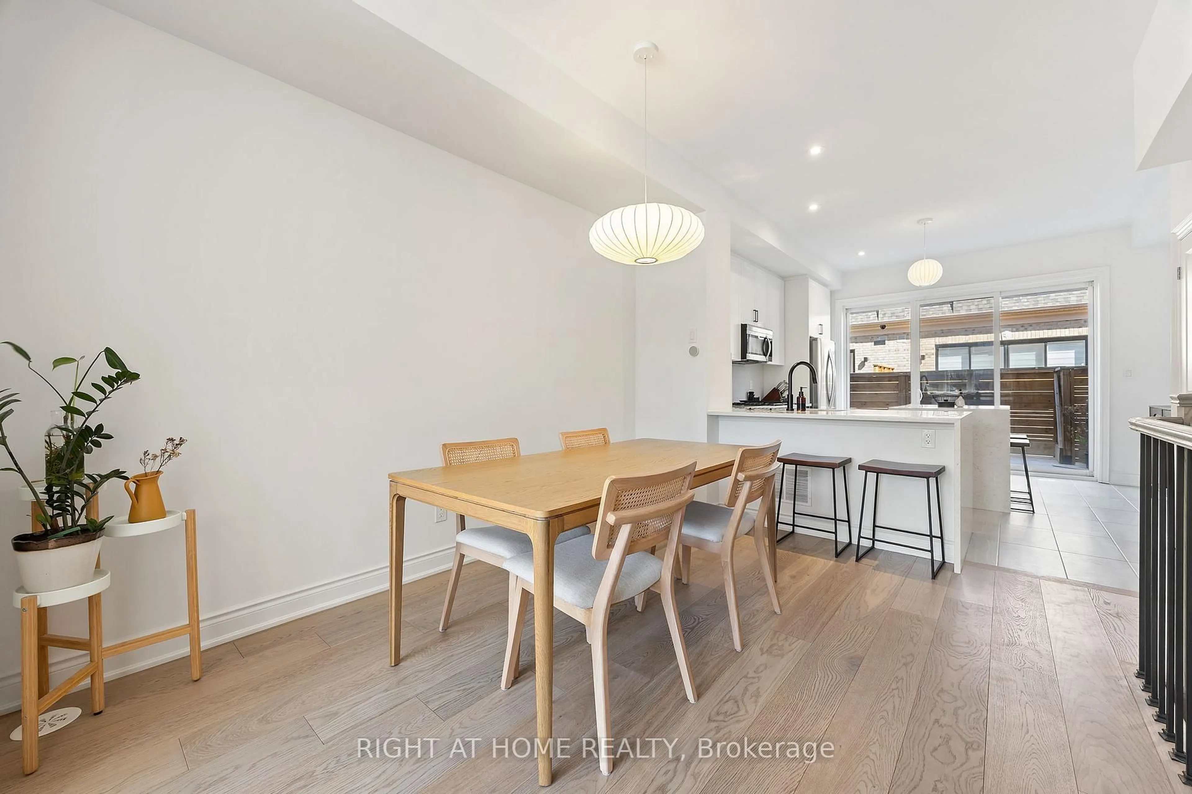 Dining room, wood/laminate floor for 10 Lunar Cres #21, Mississauga Ontario L5M 2P6