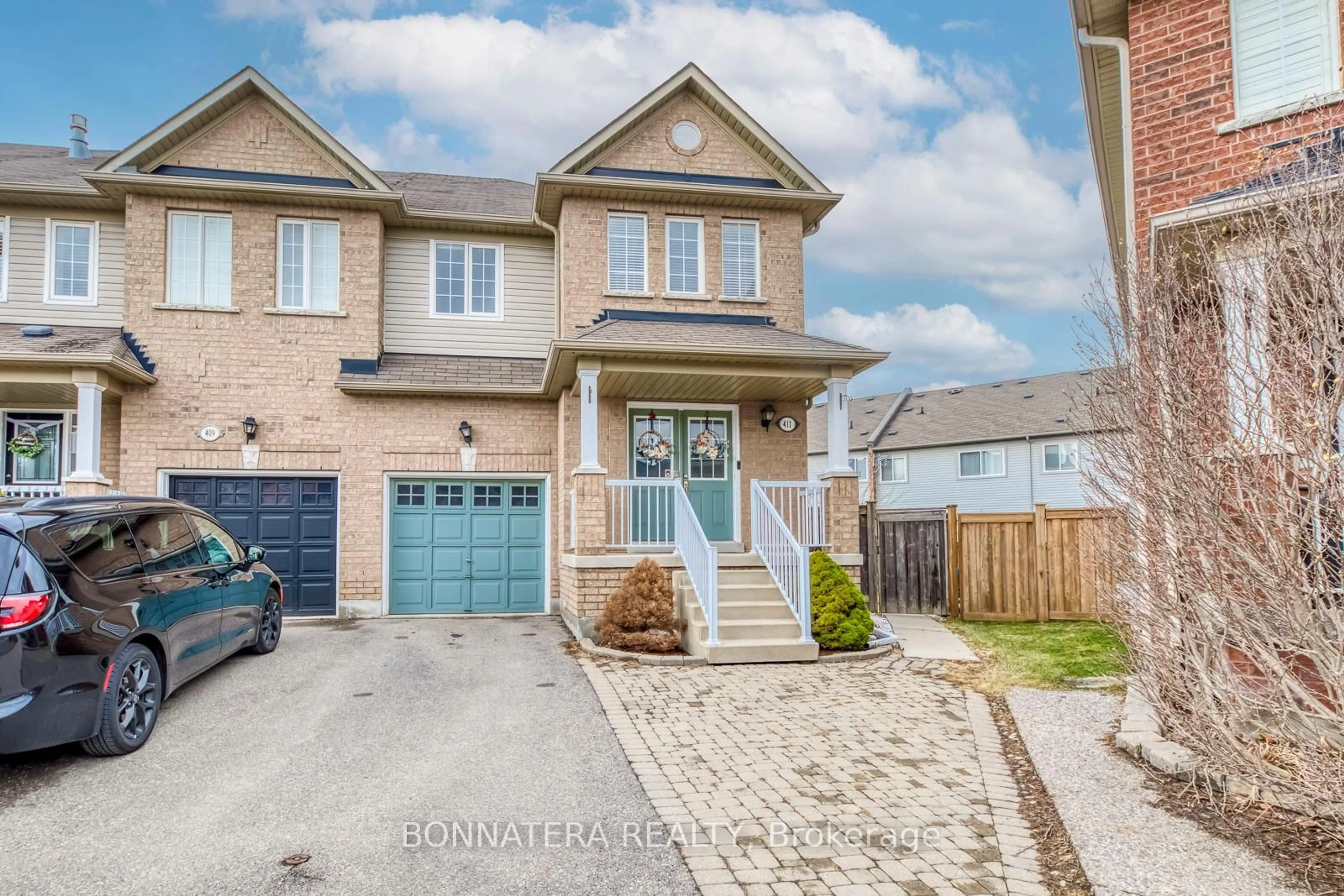 Home with brick exterior material, street for 411 Hobbs Cres, Milton Ontario L9T 0J2