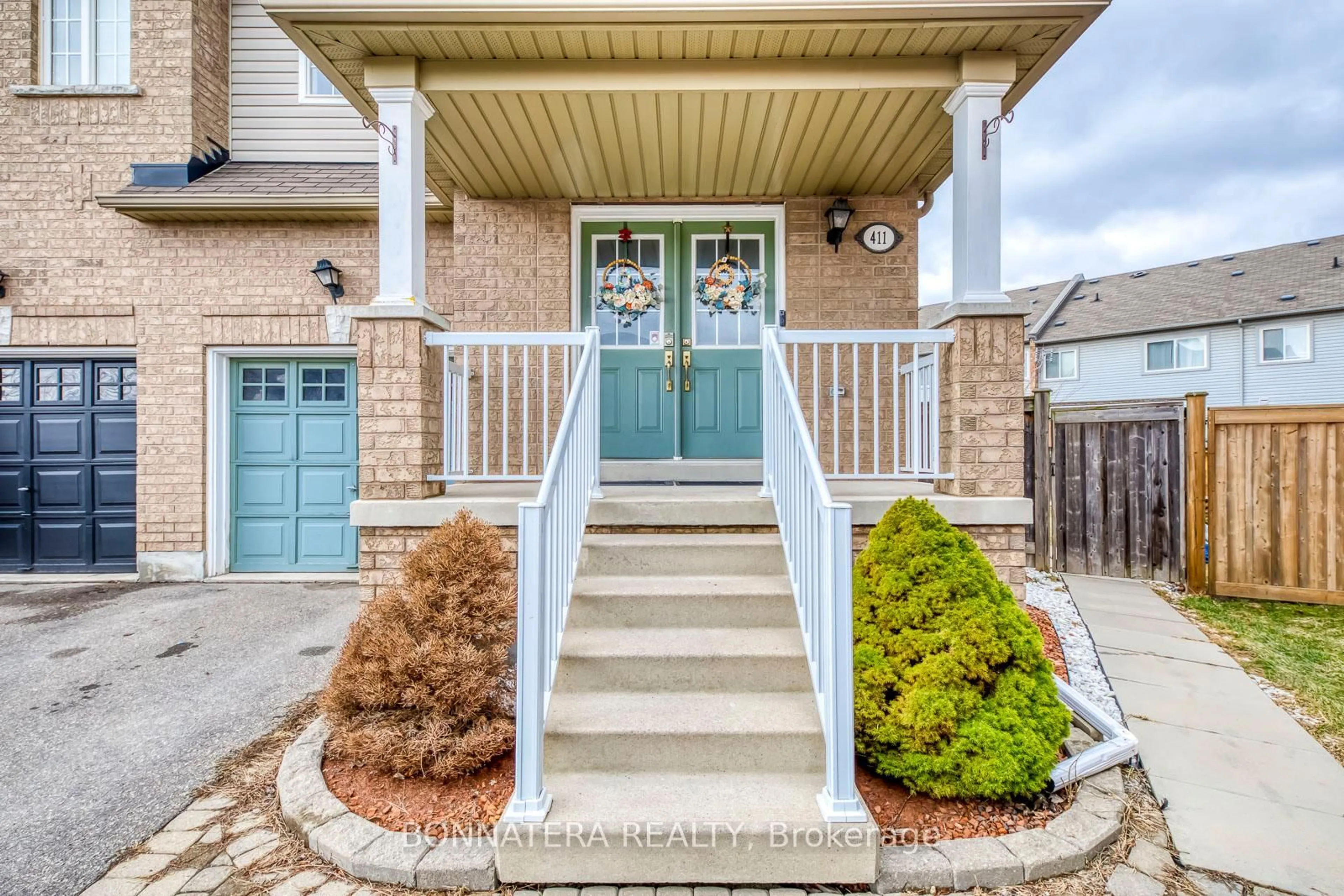 Home with brick exterior material, street for 411 Hobbs Cres, Milton Ontario L9T 0J2