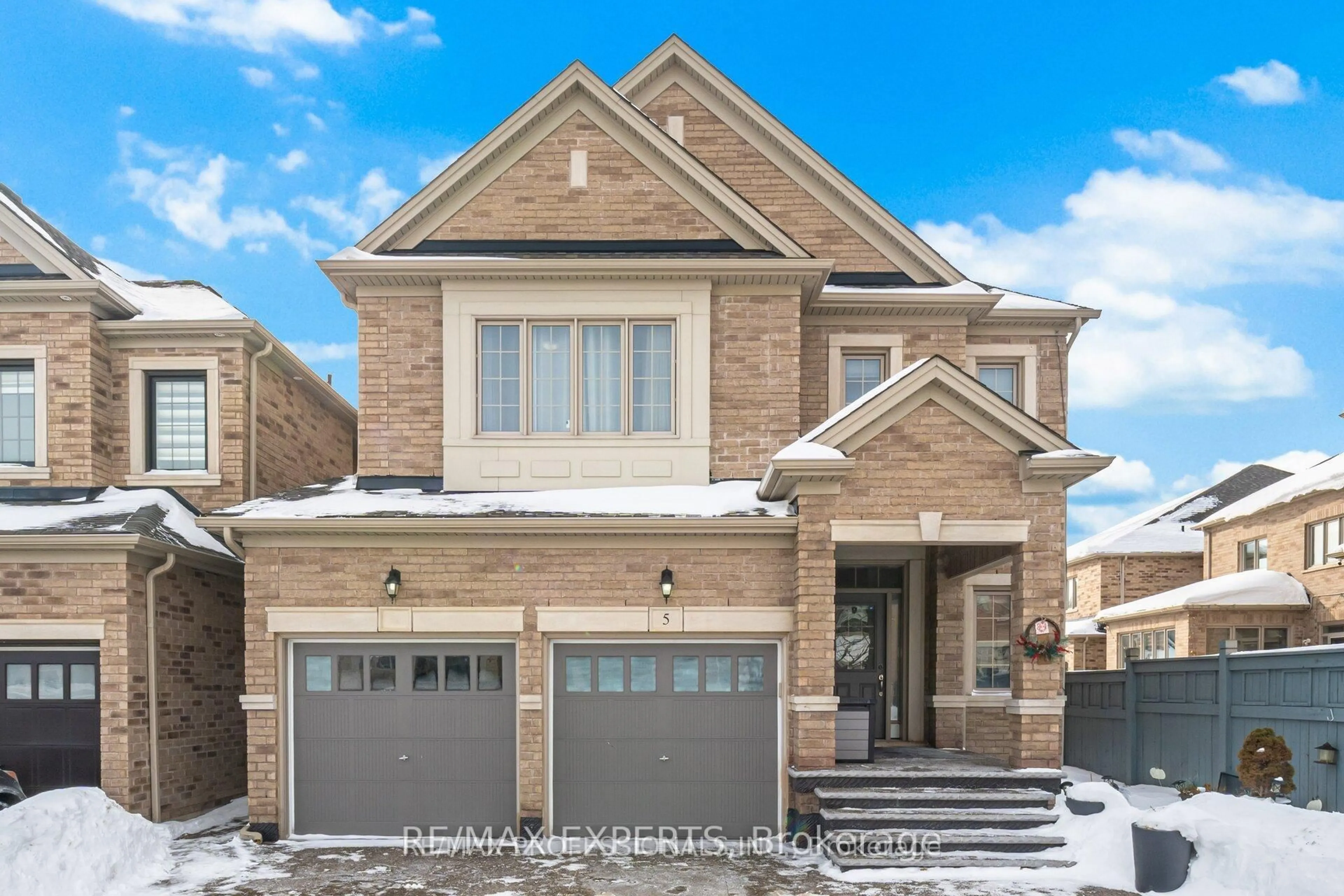 Home with brick exterior material, street for 5 Mugford Cres, Brampton Ontario L6Y 6A7