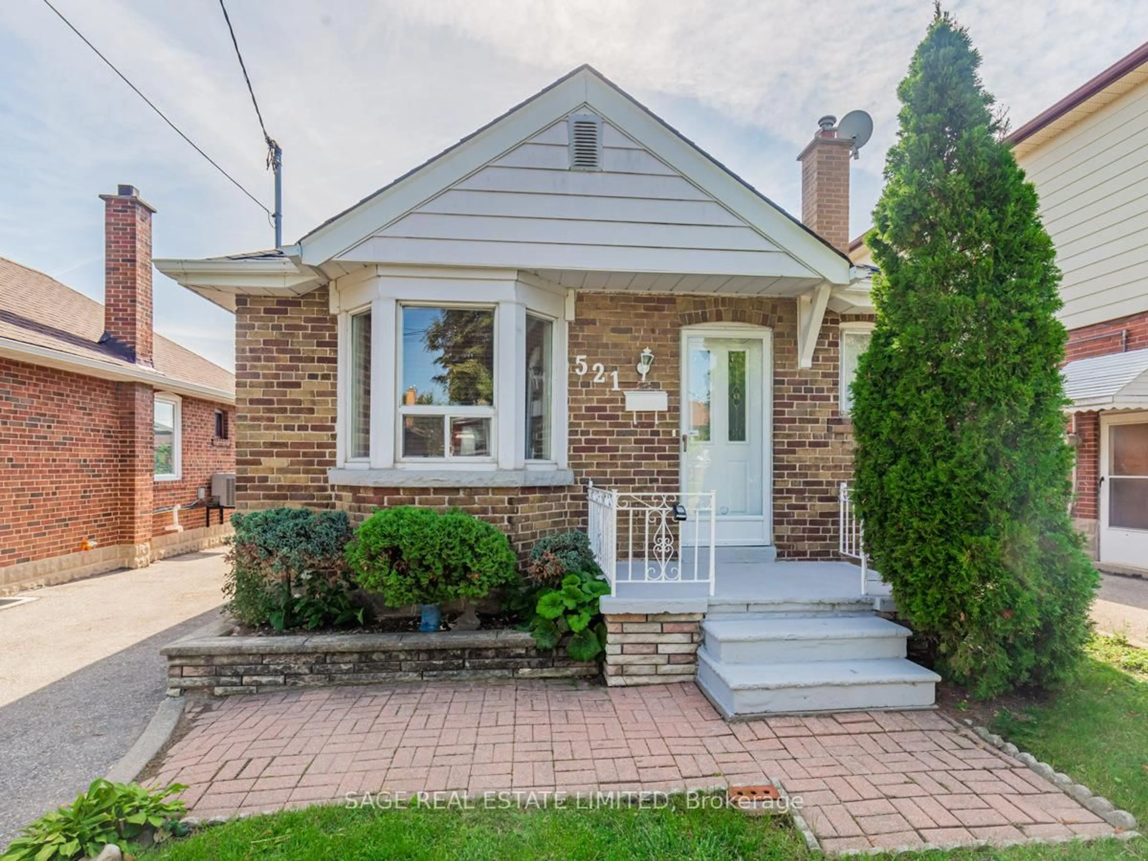 Home with brick exterior material, street for 521 Glen Park Ave, Toronto Ontario M6B 2G2