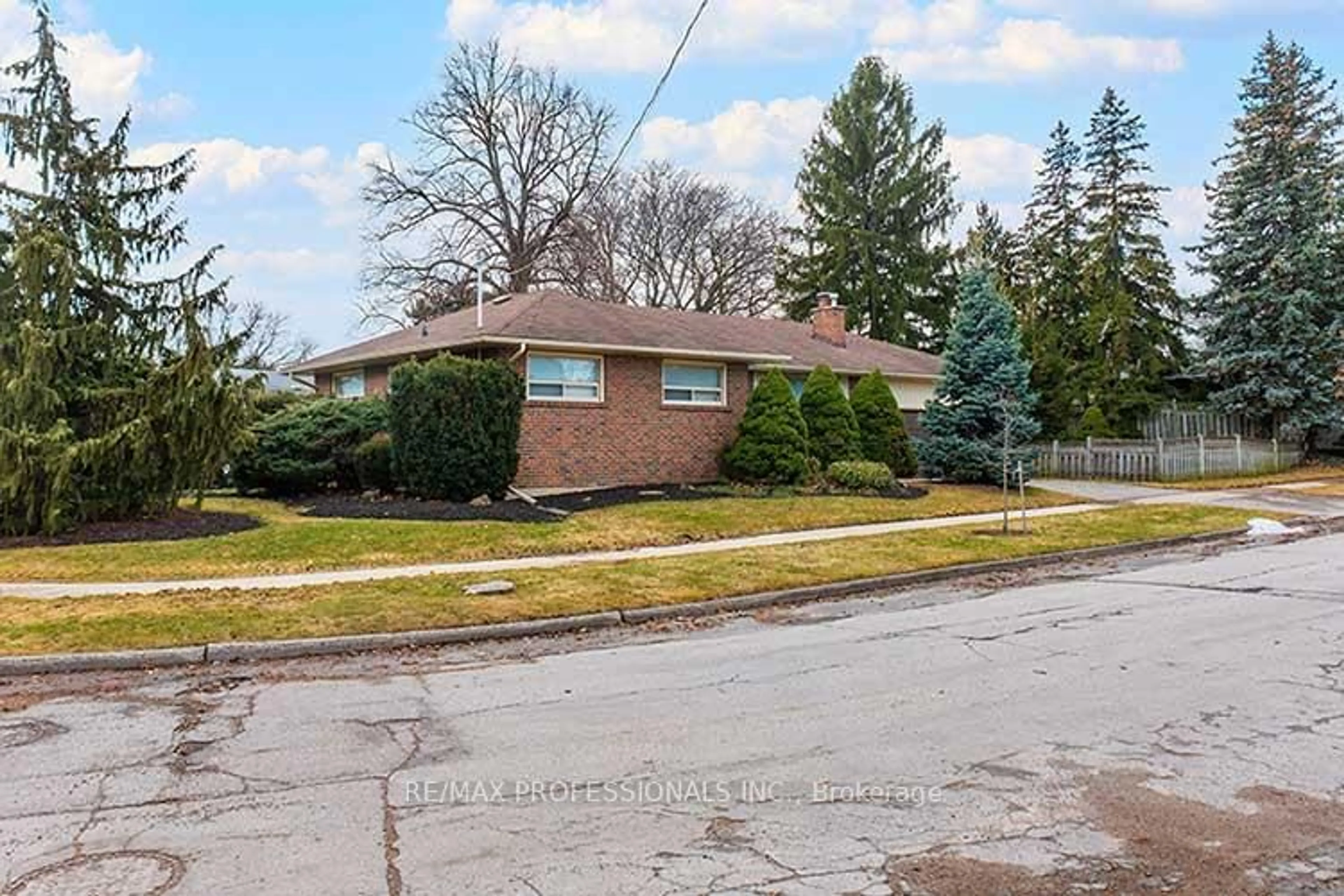 Home with brick exterior material, street for 40 Sedgebrook Cres, Toronto Ontario M9B 2X1
