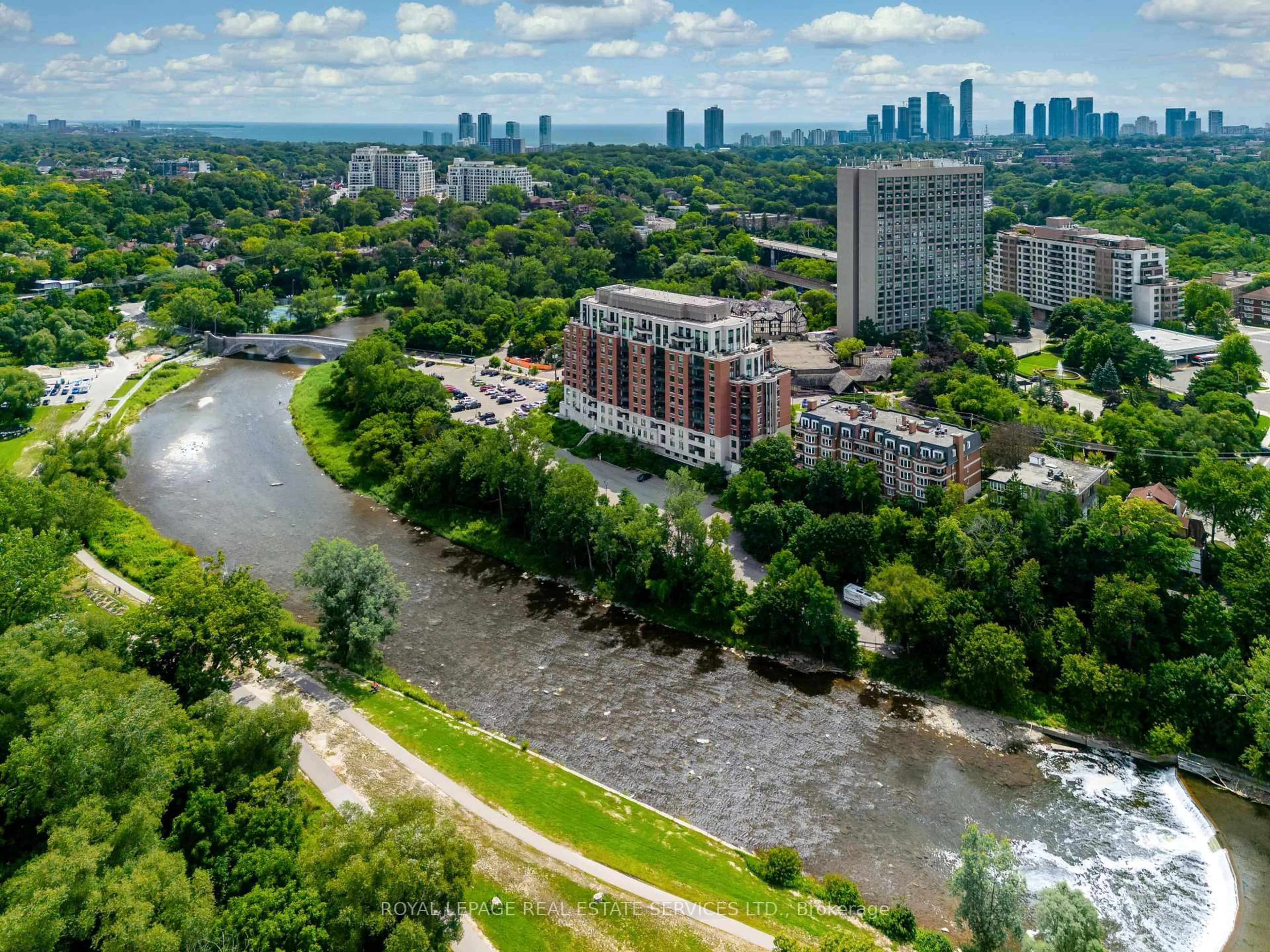 A pic from outside/outdoor area/front of a property/back of a property/a pic from drone, water/lake/river/ocean view for 30 Old Mill Rd #1002, Toronto Ontario M8X 0A5