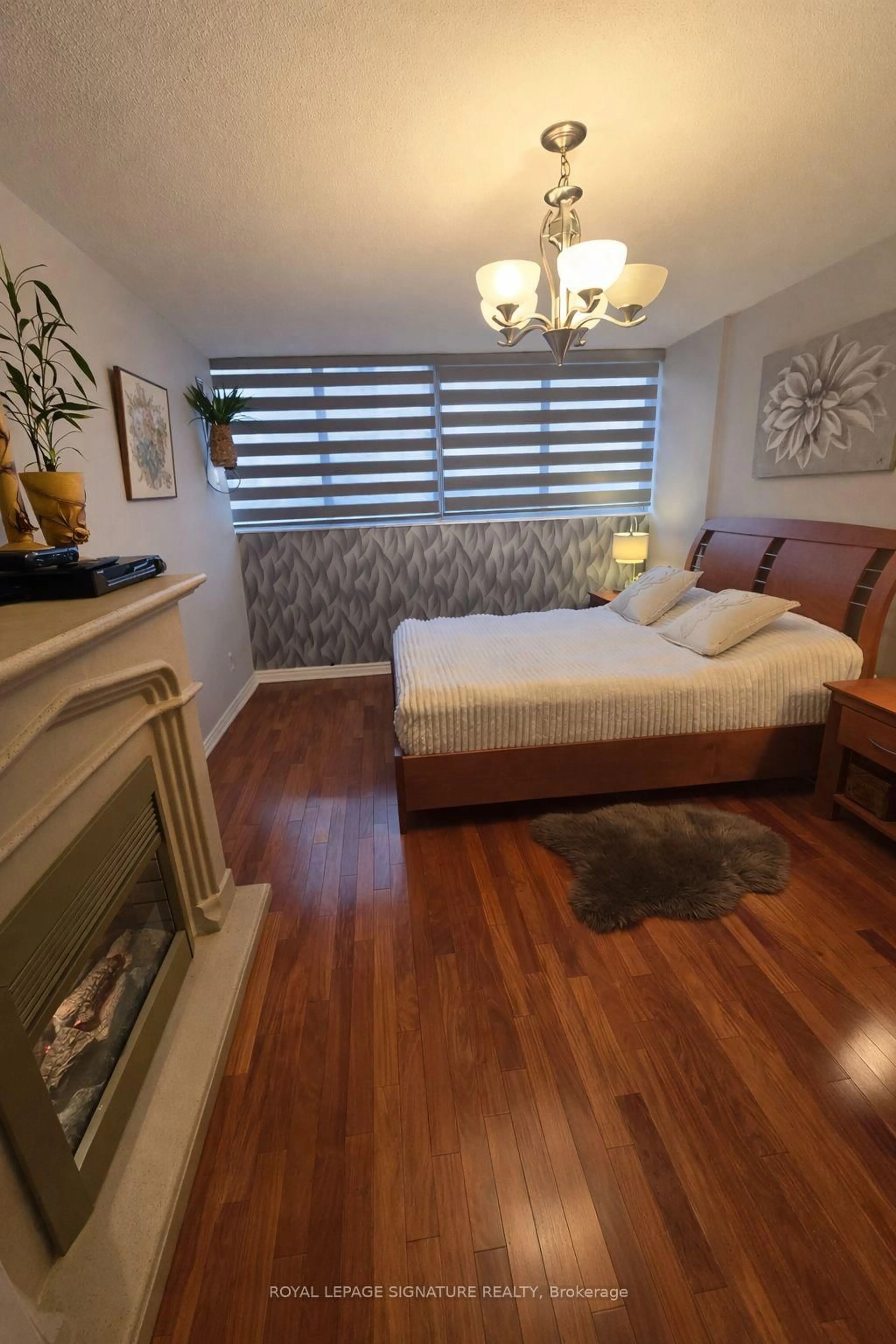 Bedroom with bed, wood/laminate floor for 11 Wincott Dr #705, Toronto Ontario M9R 2R9