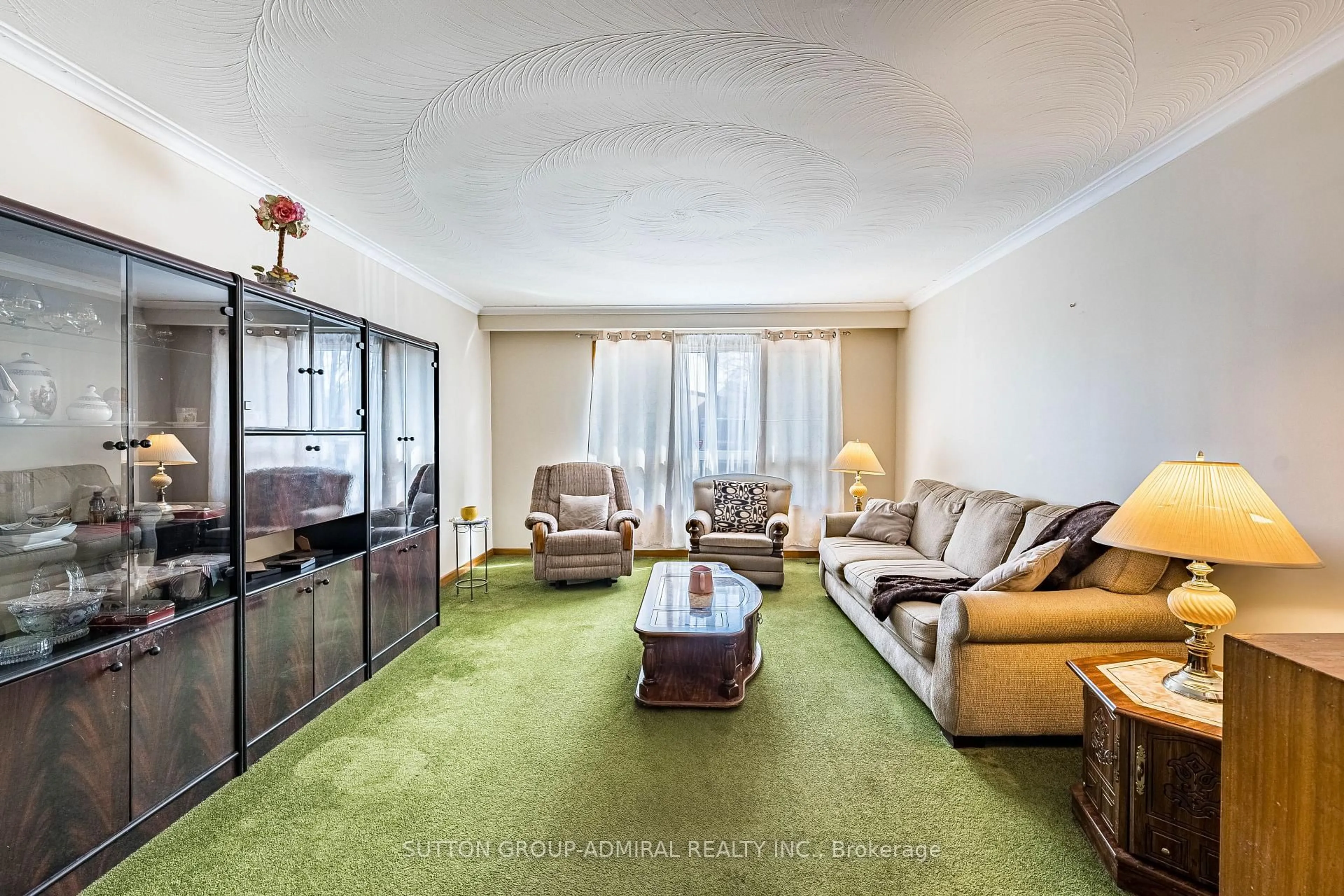 Living room with furniture, carpet floor for 92 Redgrave Dr, Toronto Ontario M9R 3V3