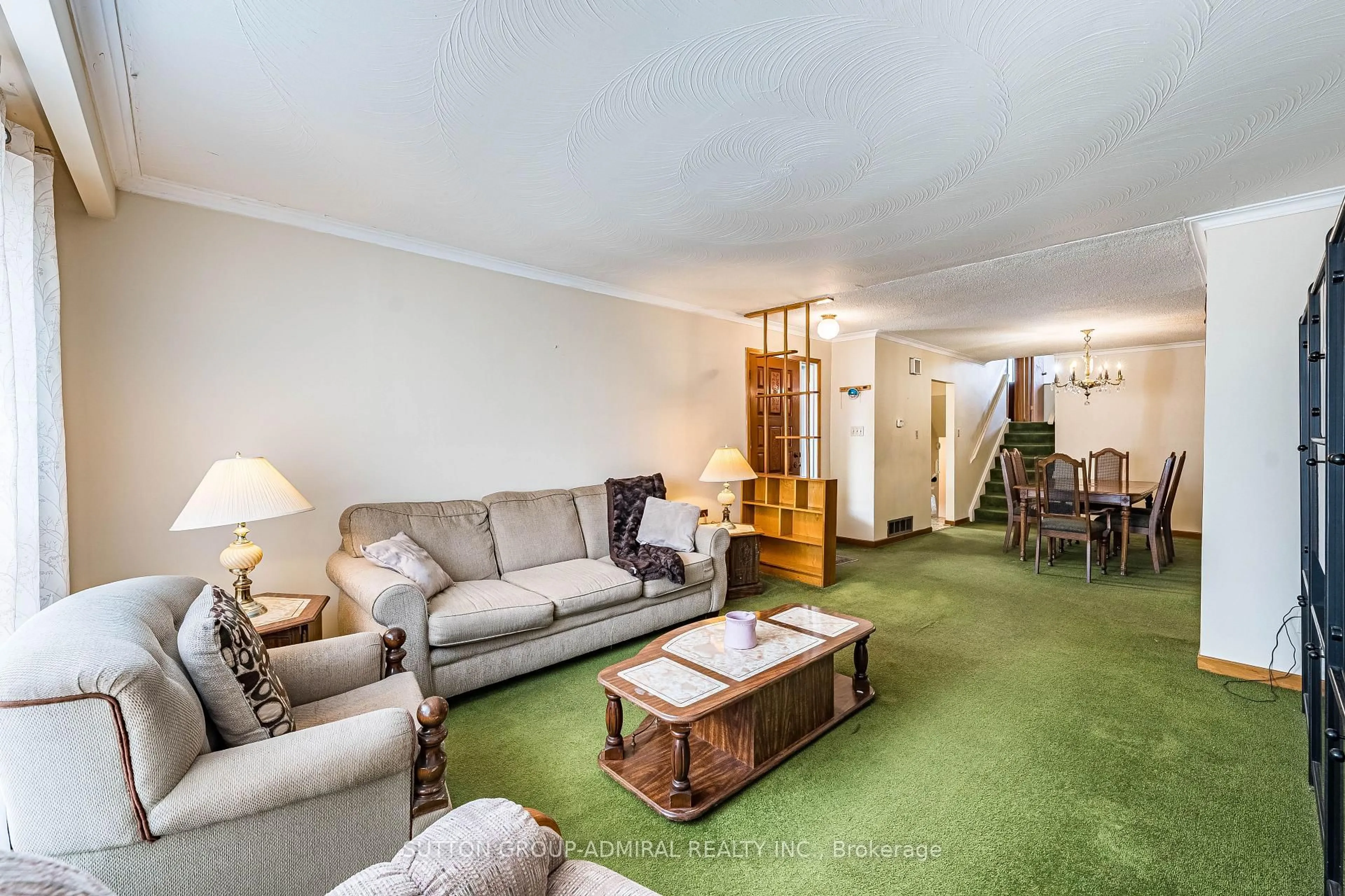 Living room with furniture, carpet floor for 92 Redgrave Dr, Toronto Ontario M9R 3V3