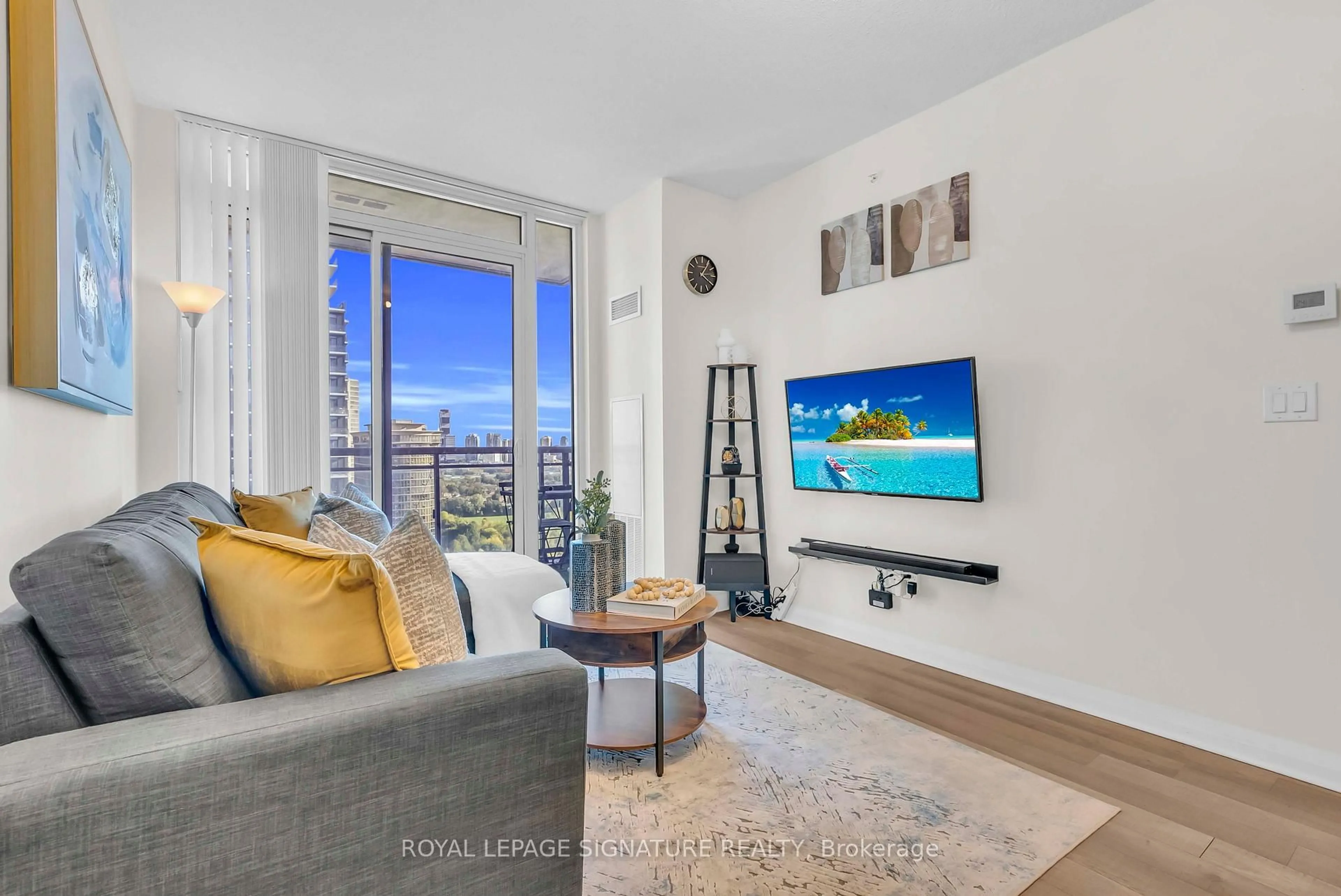 Living room with furniture, unknown for 5033 Four Springs Ave #1811, Mississauga Ontario L5R 0G6