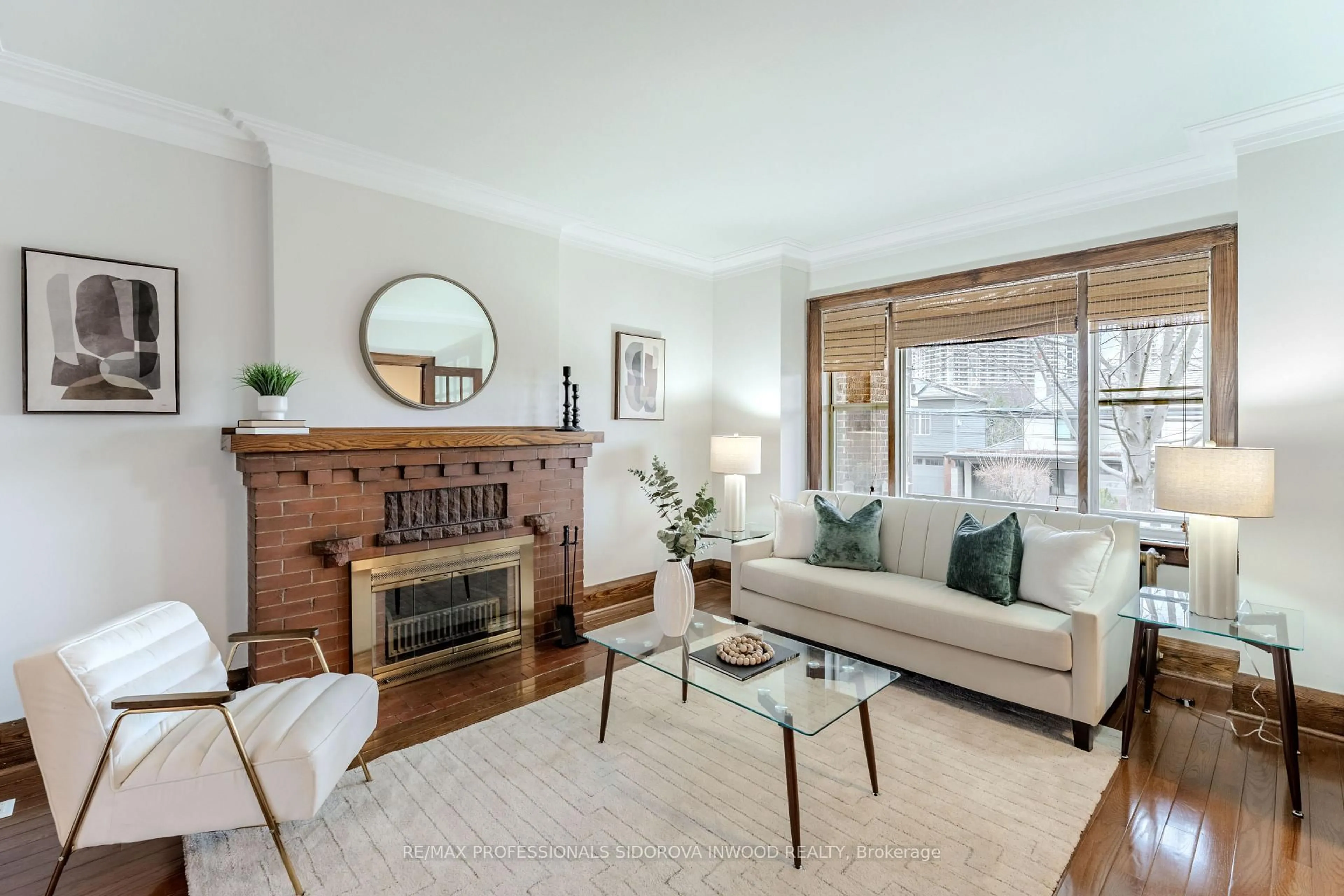 Living room with furniture, wood/laminate floor for 48 Evelyn Ave, Toronto Ontario M6P 2Y9