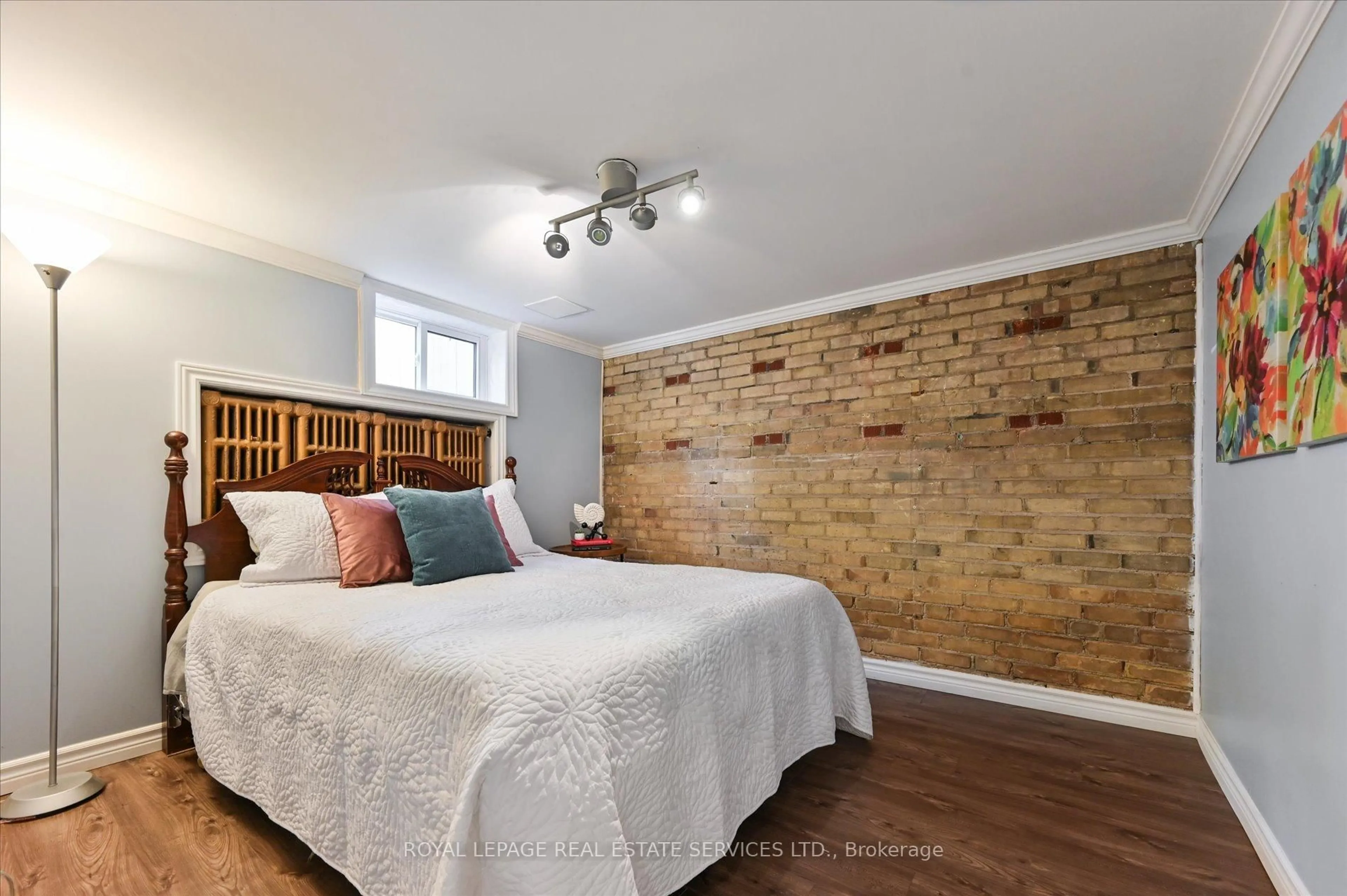 Bedroom with bed, wood/laminate floor for 11 King Street Cres, Toronto Ontario M9N 1K7