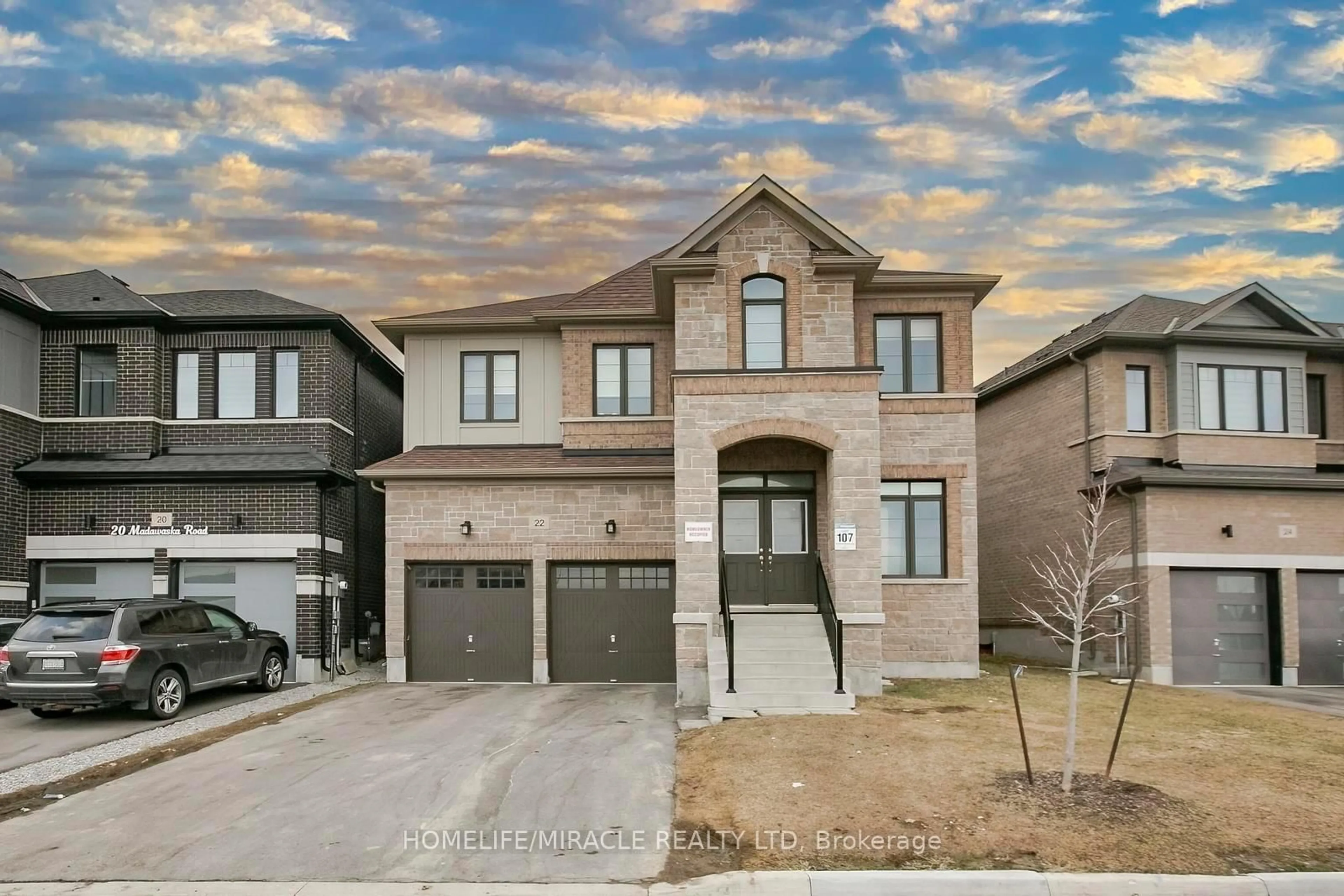 Home with brick exterior material, street for 22 Madawaska Rd, Caledon Ontario L7C 4J5