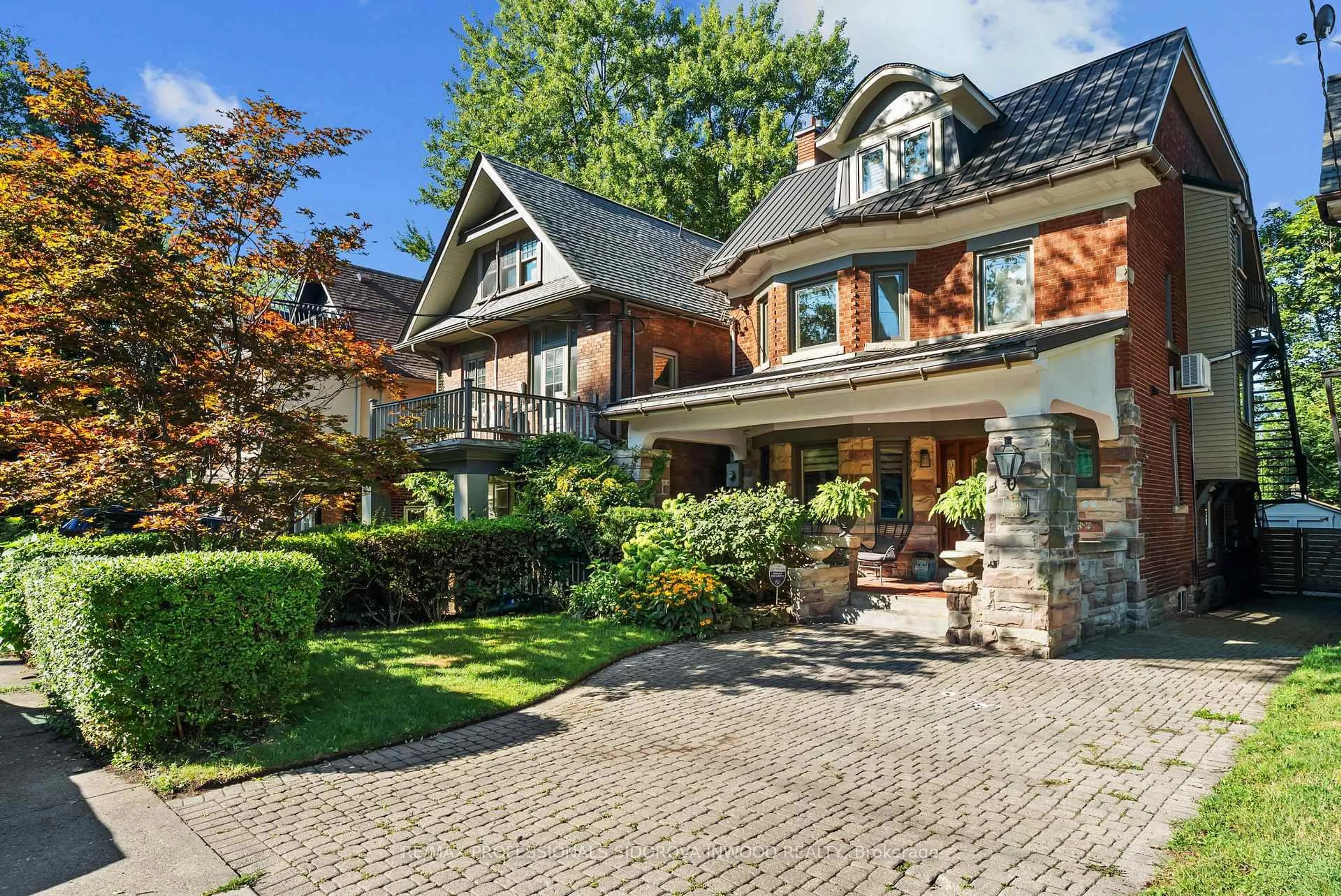 Home with brick exterior material, street for 260 Indian Rd, Toronto Ontario M6R 2X2