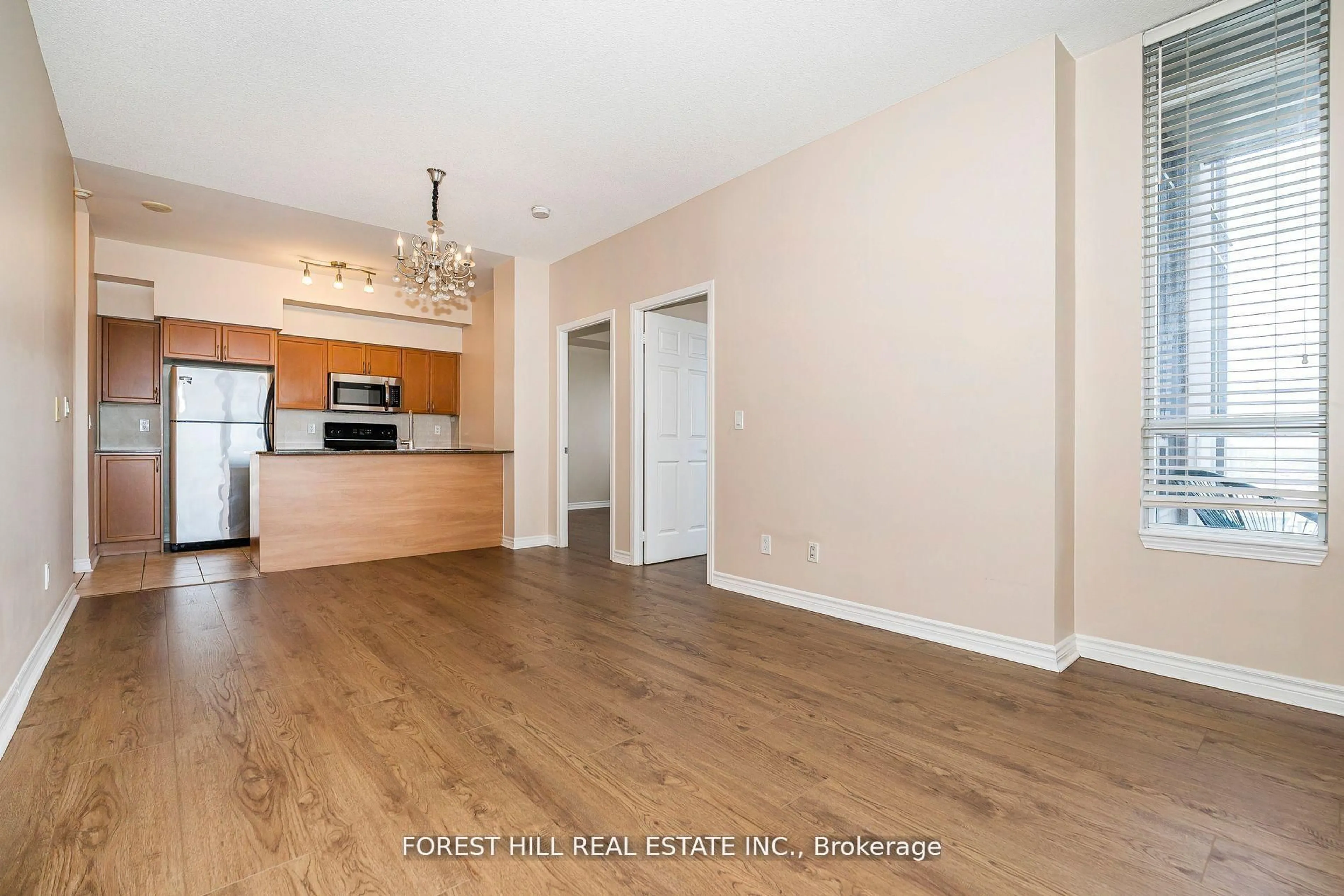 Open concept kitchen, wood/laminate floor for 388 Prince Of Wales Dr #1610, Mississauga Ontario L5B 0A1