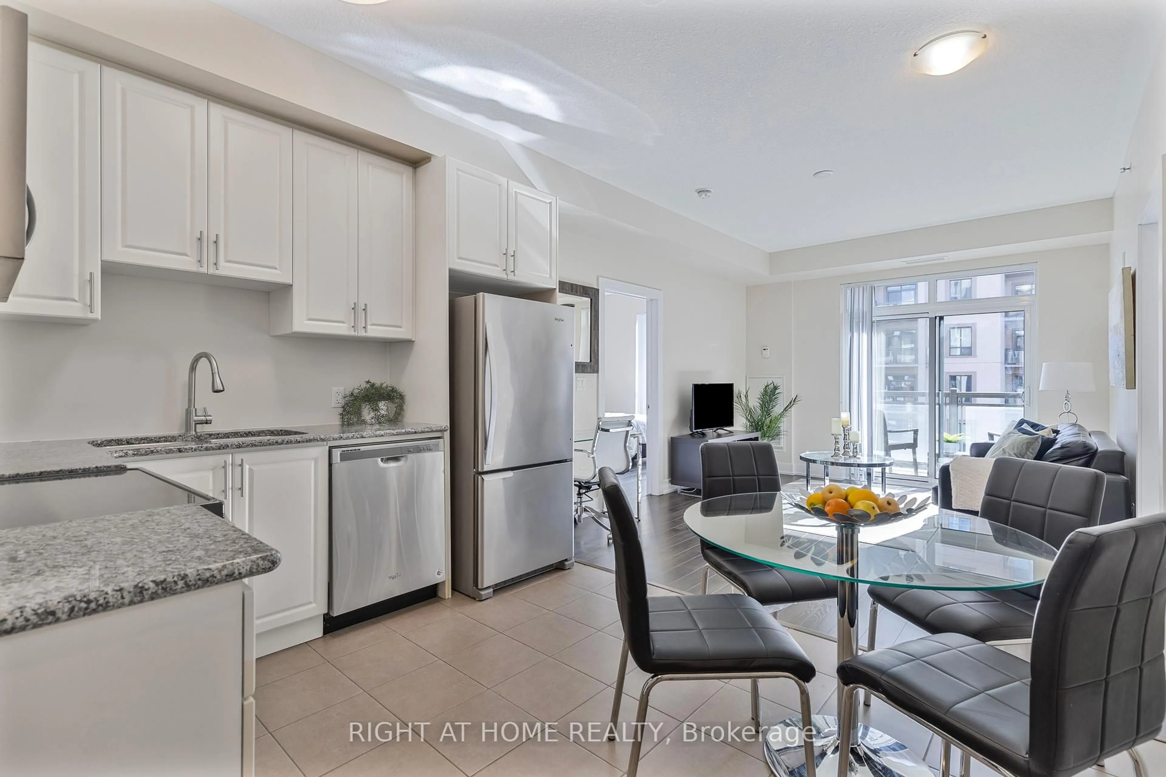 Open concept kitchen, ceramic/tile floor for 2486 Old Bronte Rd #423, Oakville Ontario L6M 4J2