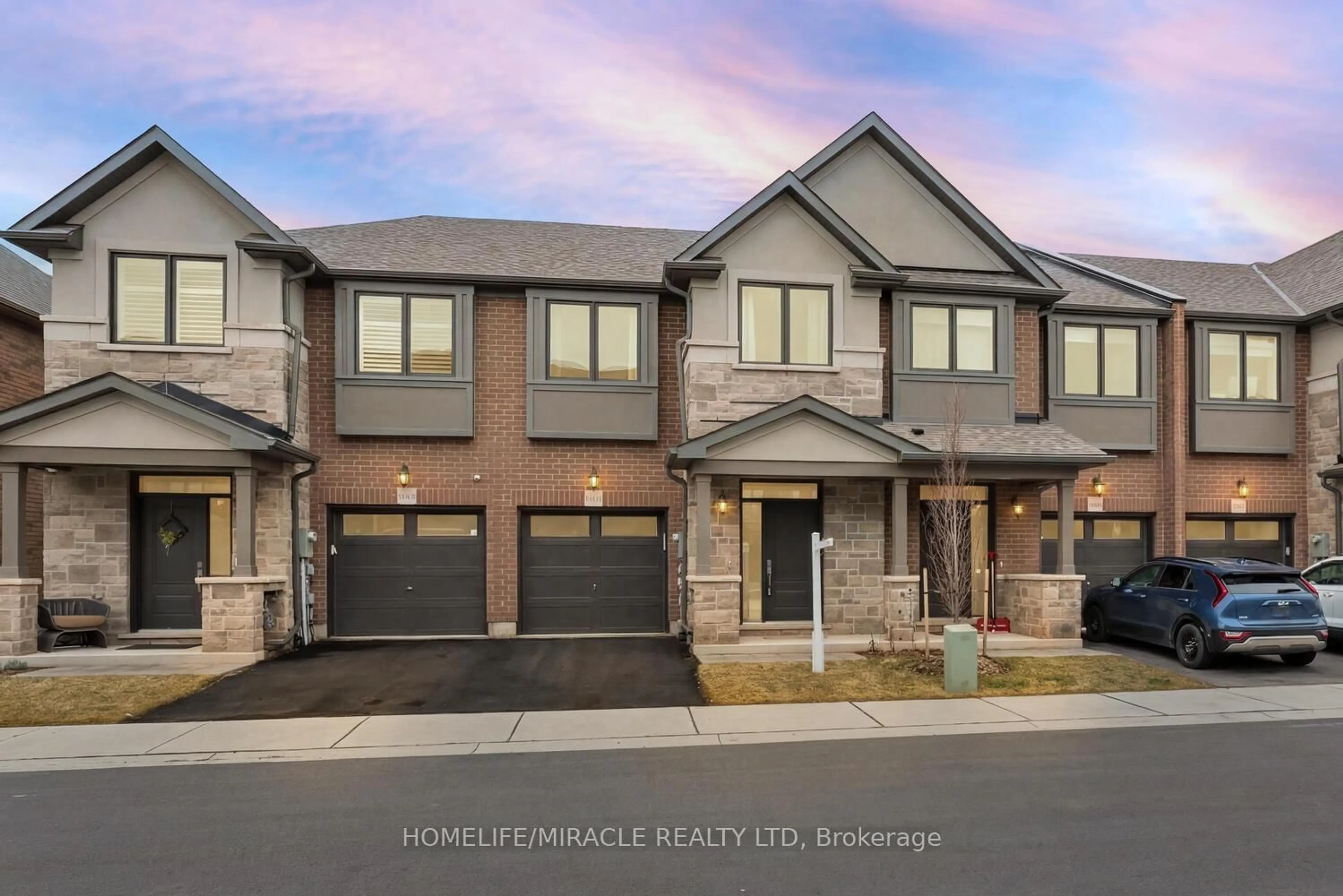Home with brick exterior material, street for 2184 Postmaster Dr #13, Oakville Ontario L6M 3X1