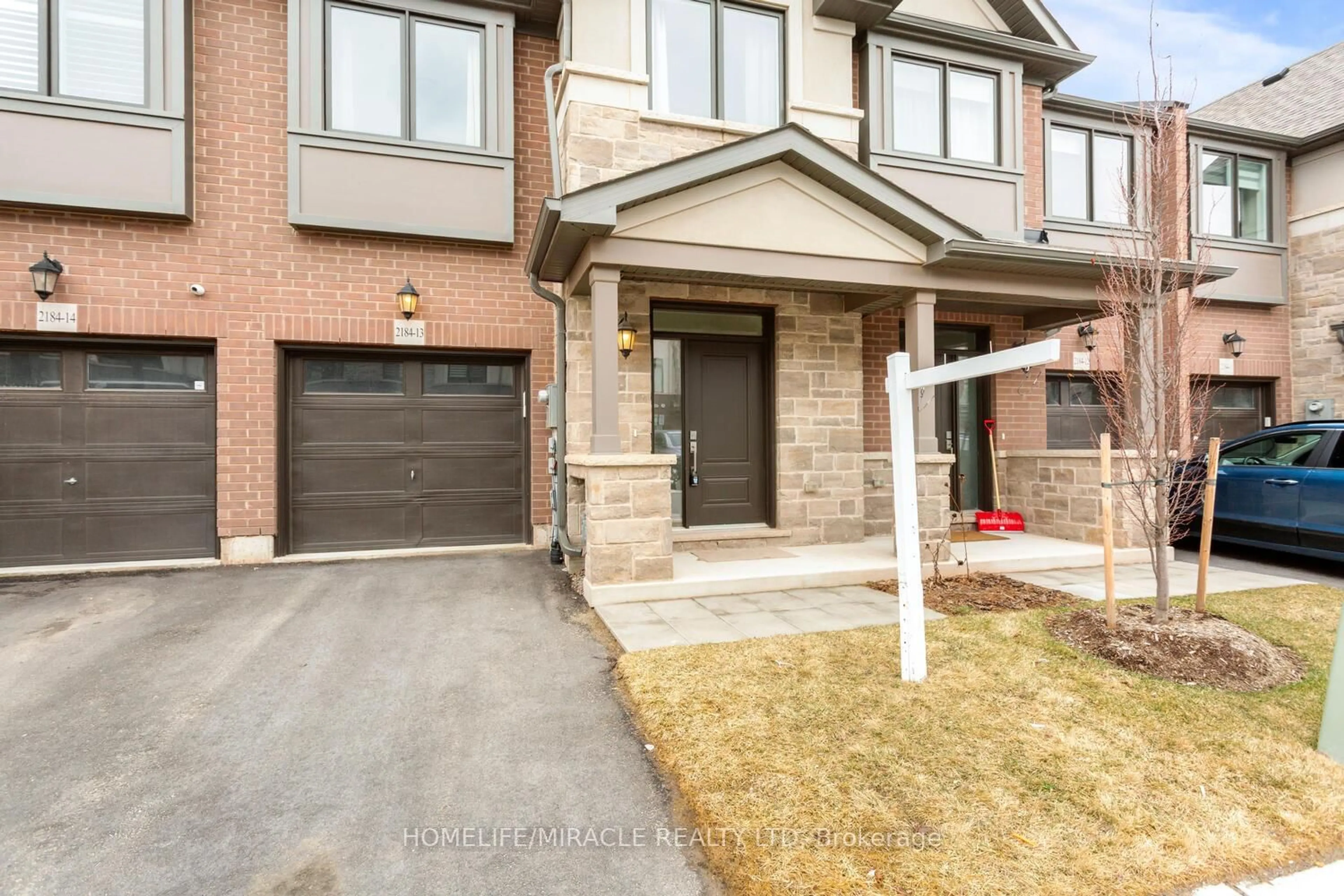 Home with brick exterior material, street for 2184 Postmaster Dr #13, Oakville Ontario L6M 3X1