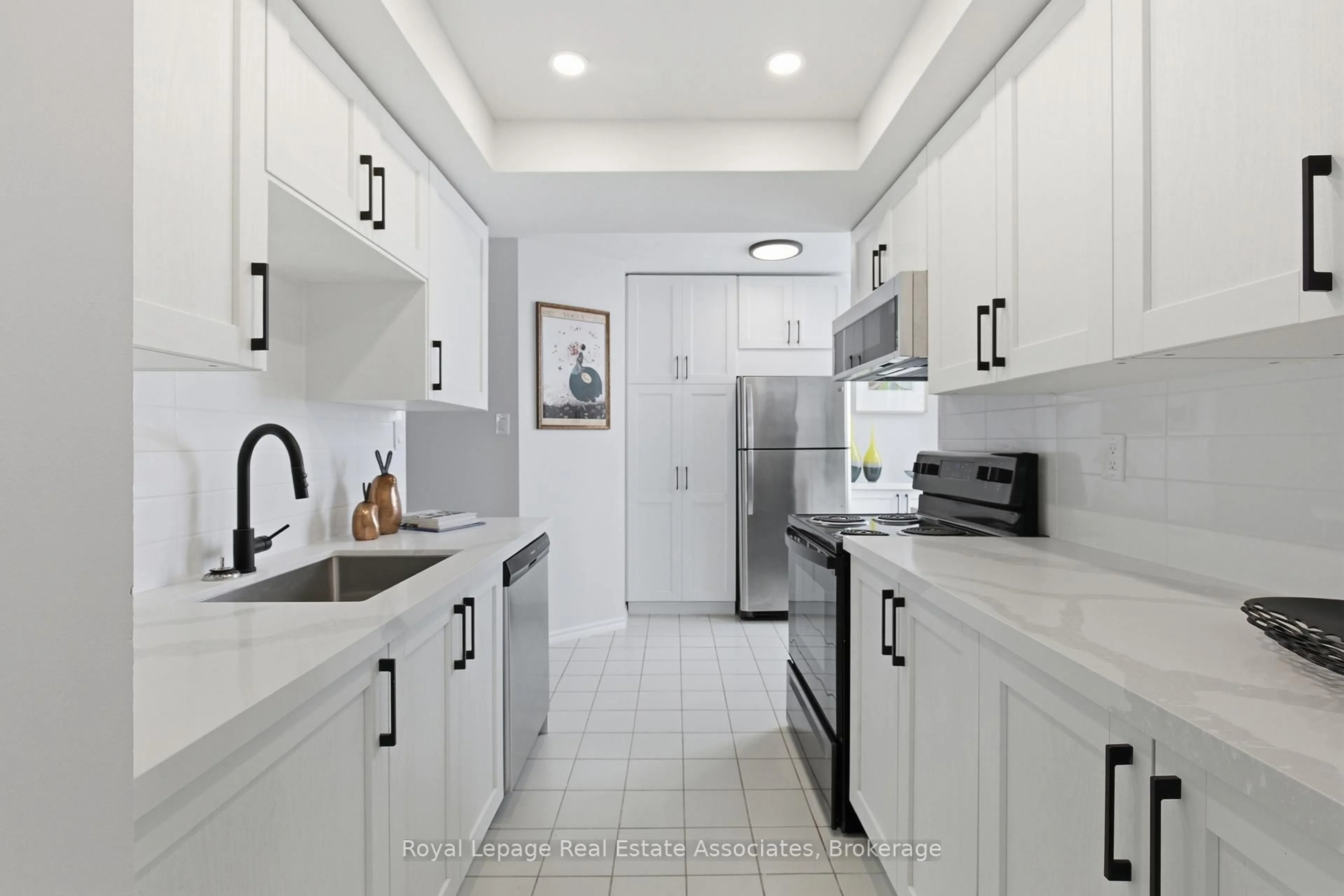 Standard kitchen, ceramic/tile floor for 10 Malta Ave #1004, Brampton Ontario L6Y 4G6