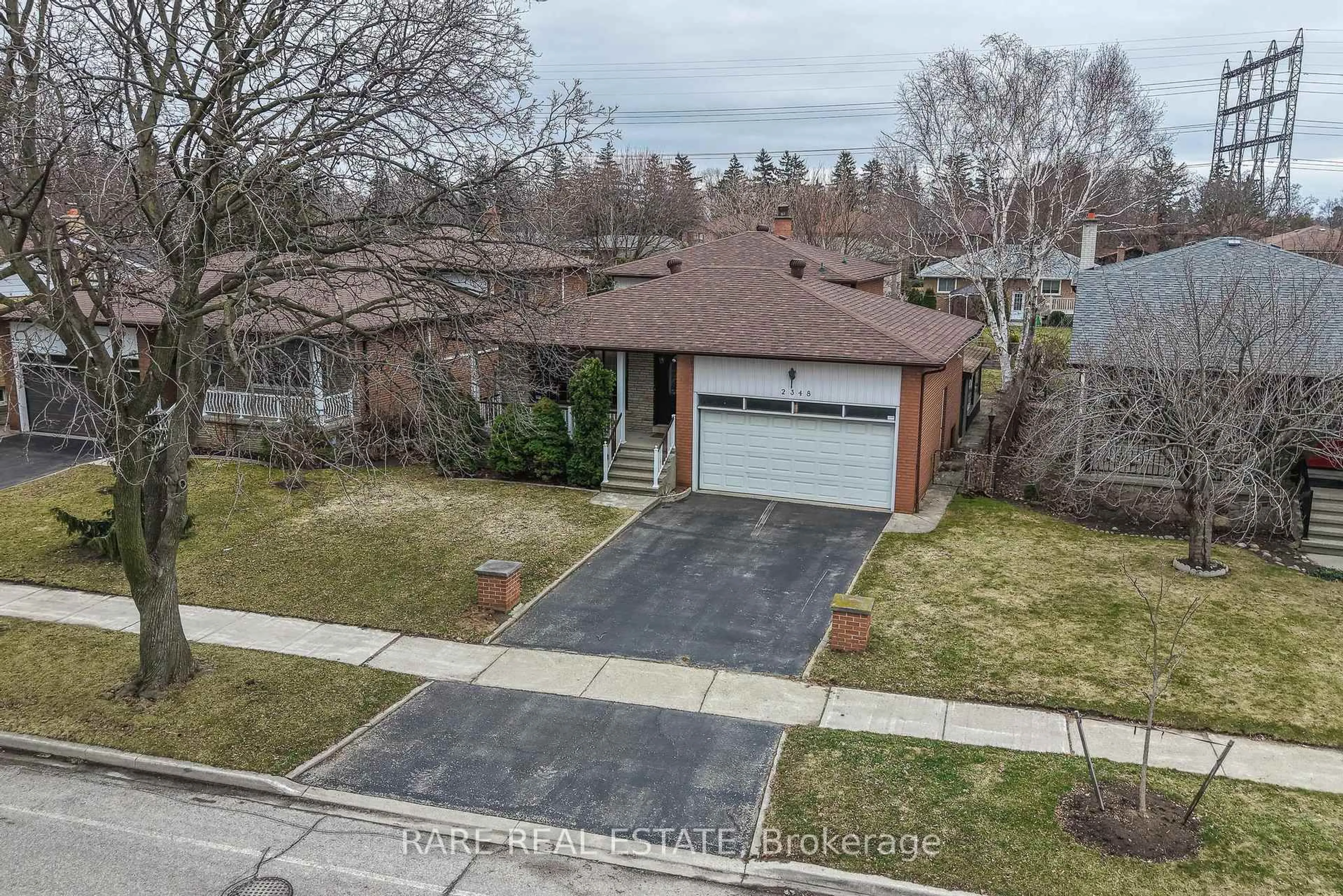 A pic from outside/outdoor area/front of a property/back of a property/a pic from drone, street for 2348 Denise Rd, Mississauga Ontario L4X 1J4