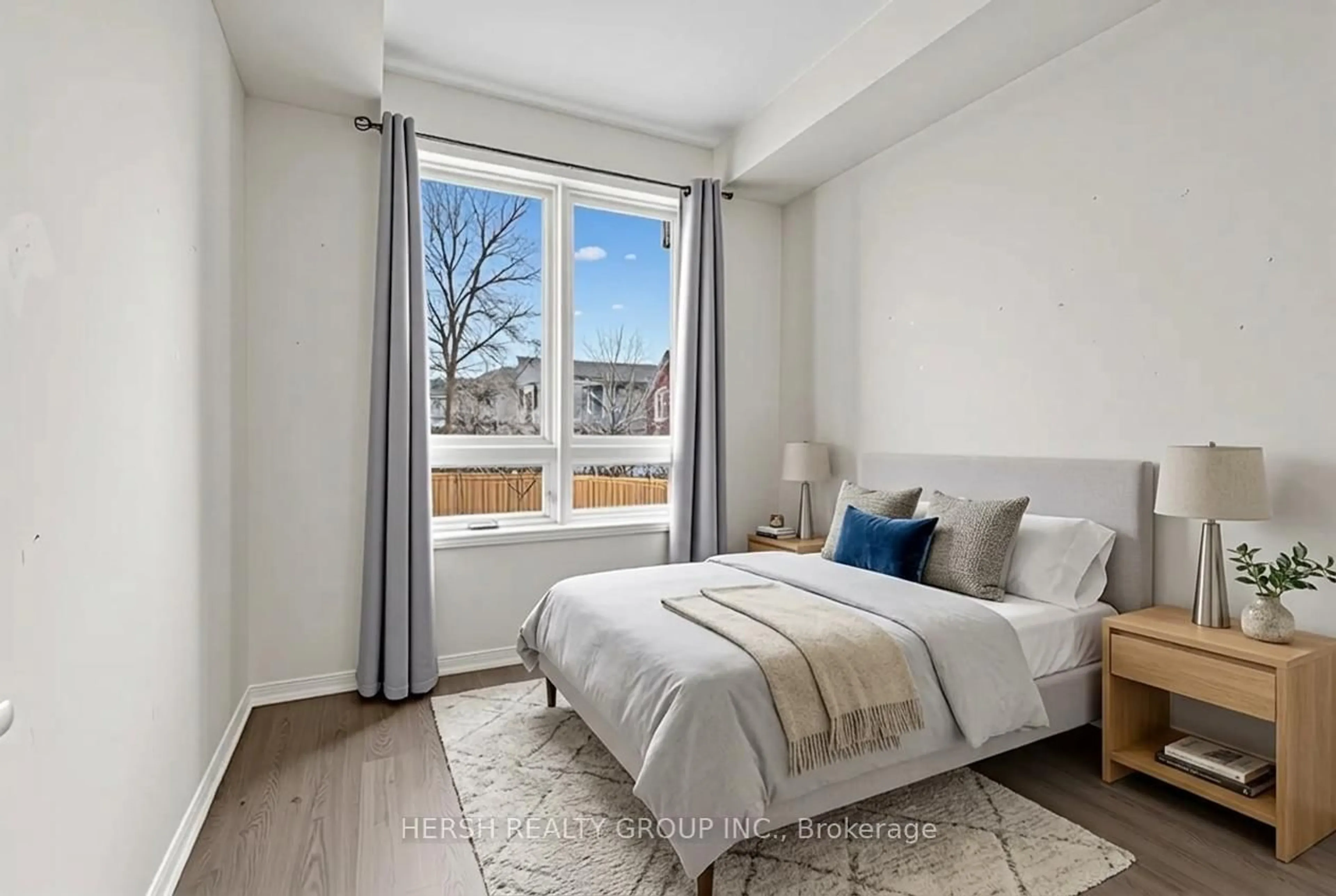 Bedroom with bed, unknown for 1100 Briar Hill Ave #204, Toronto Ontario M6B 1M7