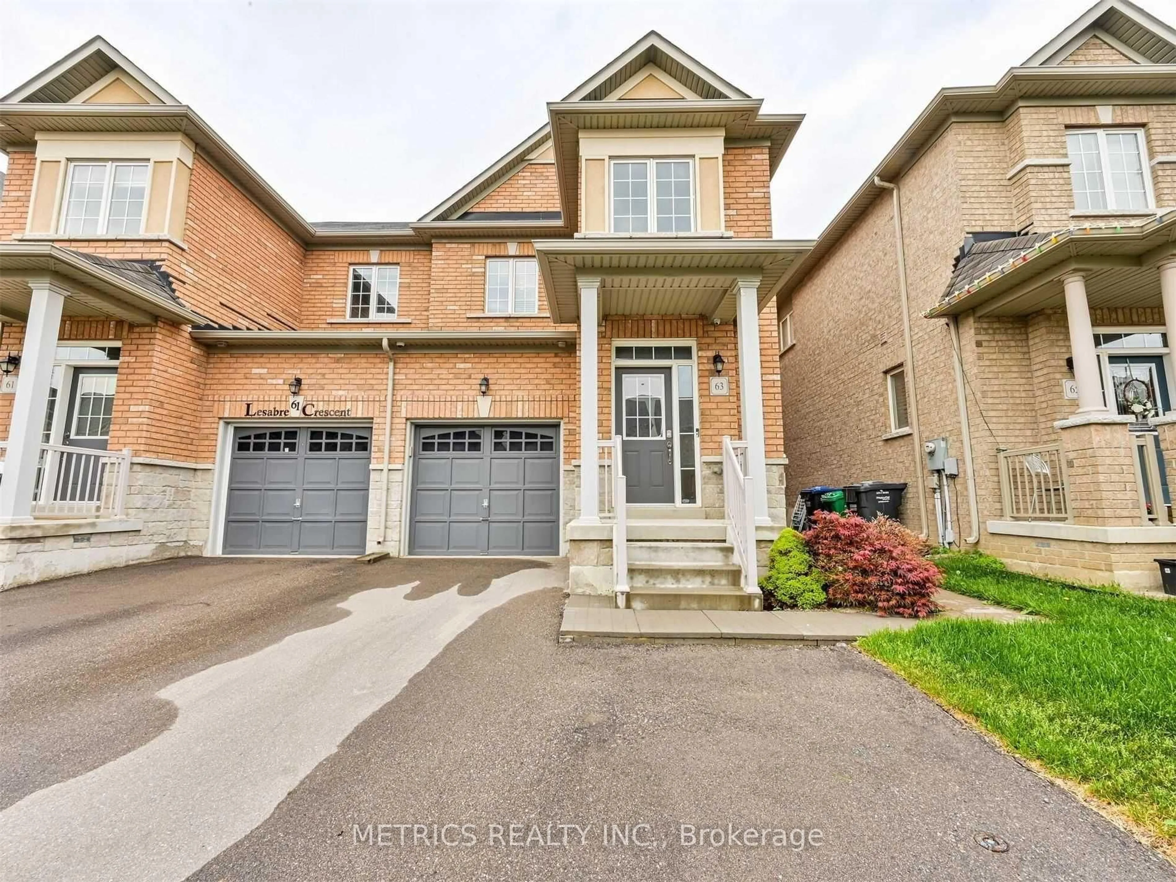 Home with brick exterior material, street for 63 Lesabre Cres, Brampton Ontario L6P 3R4