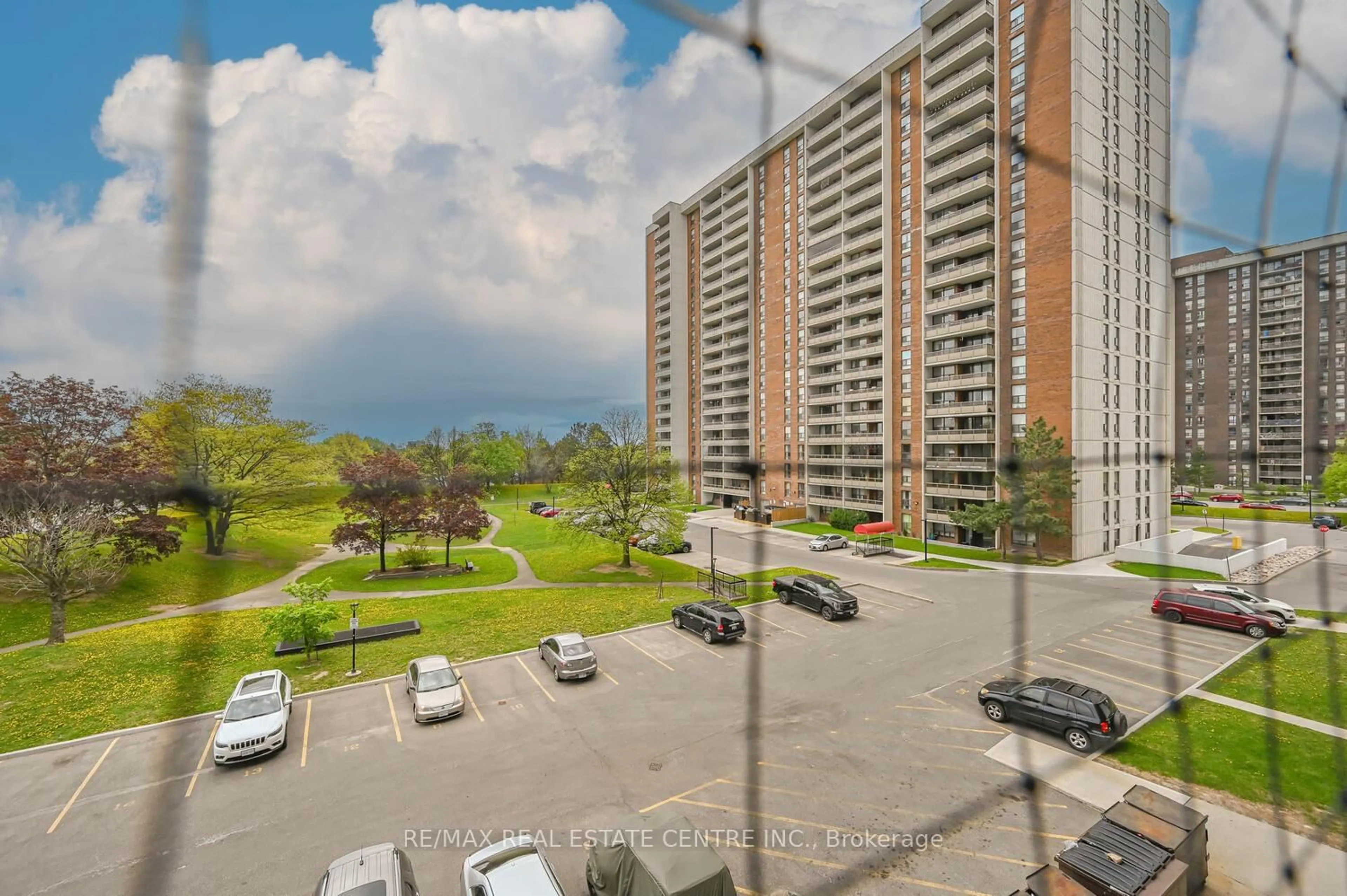 A pic from outside/outdoor area/front of a property/back of a property/a pic from drone, city buildings view from balcony for 21 Knightsbridge Rd #403, Brampton Ontario L6T 3Y1