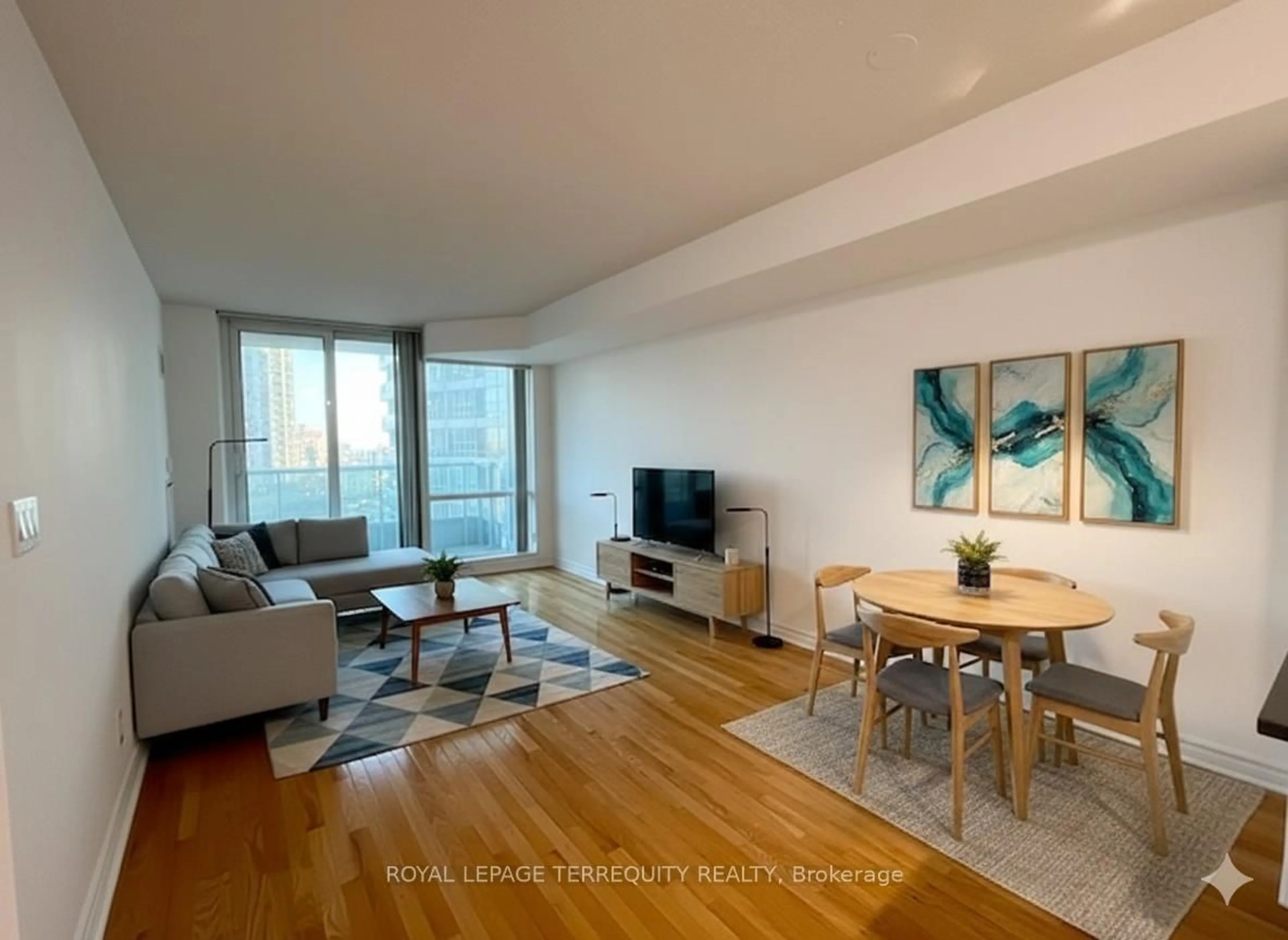 Living room with furniture, wood/laminate floor for 1 Elm Dr #1104, Mississauga Ontario L5B 4M1