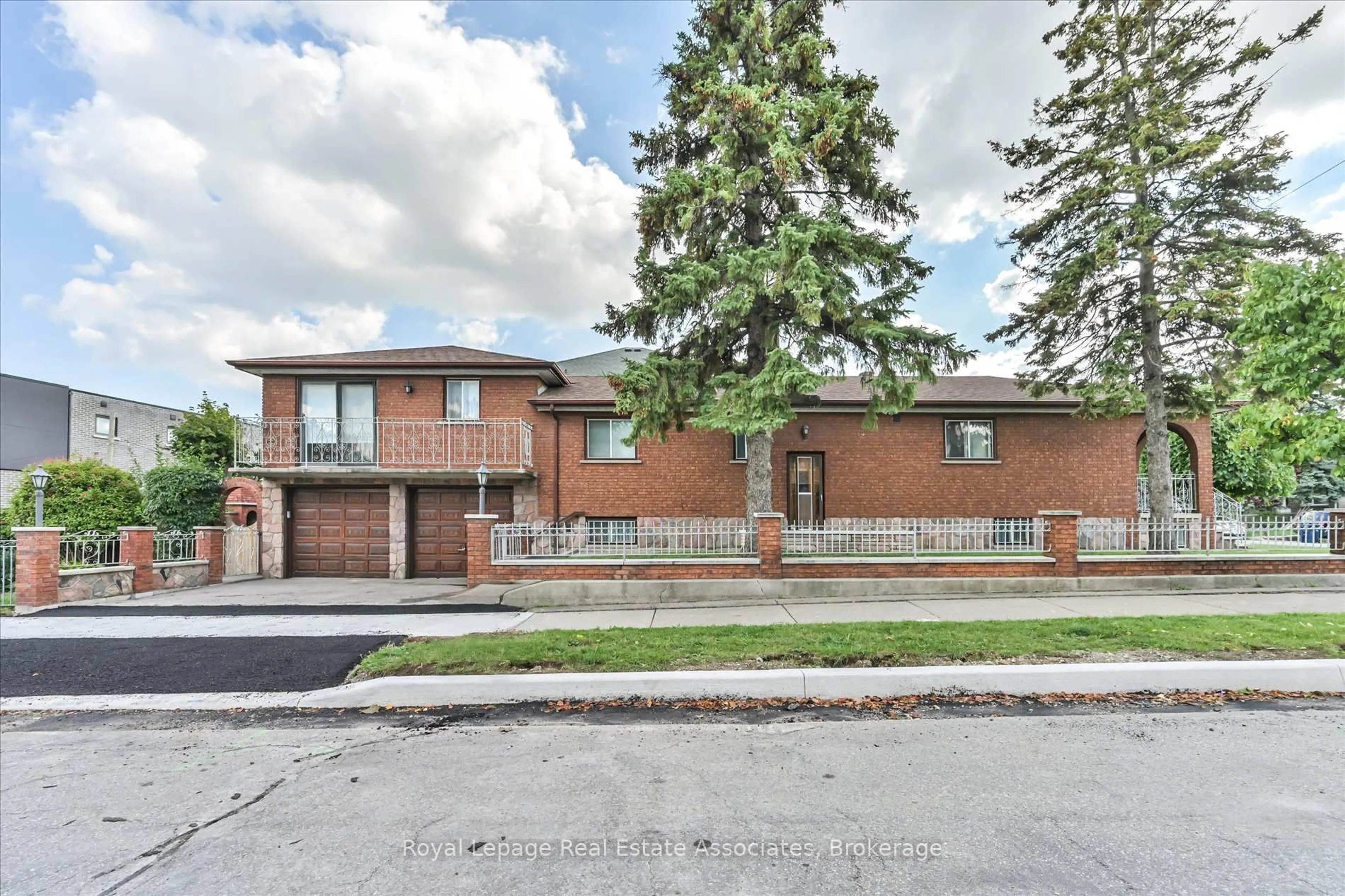 Home with brick exterior material, street for 135 Jay St, Toronto Ontario M6L 2M3
