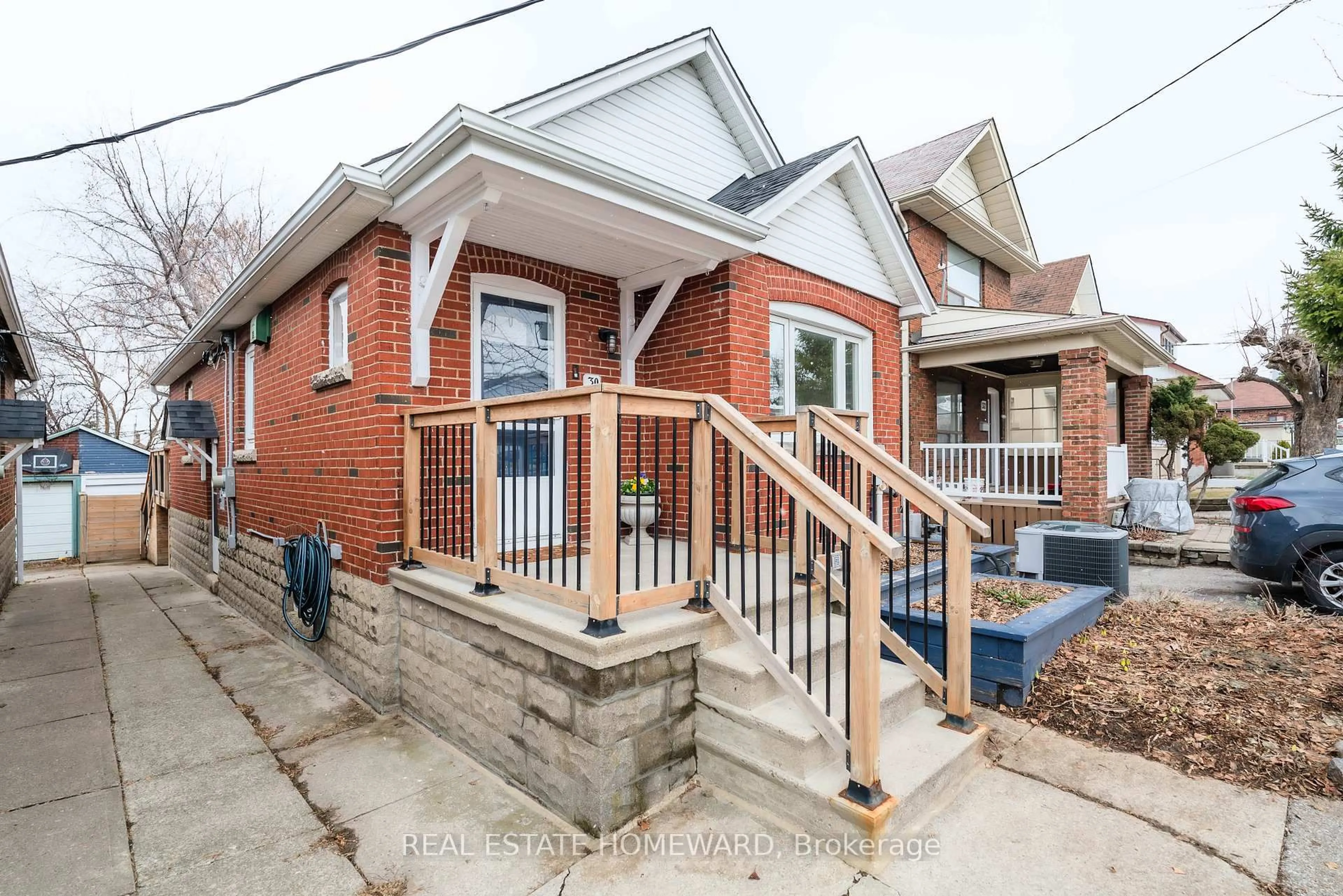 Home with brick exterior material, street for 30 Ronald Ave, Toronto Ontario M6E 4M6