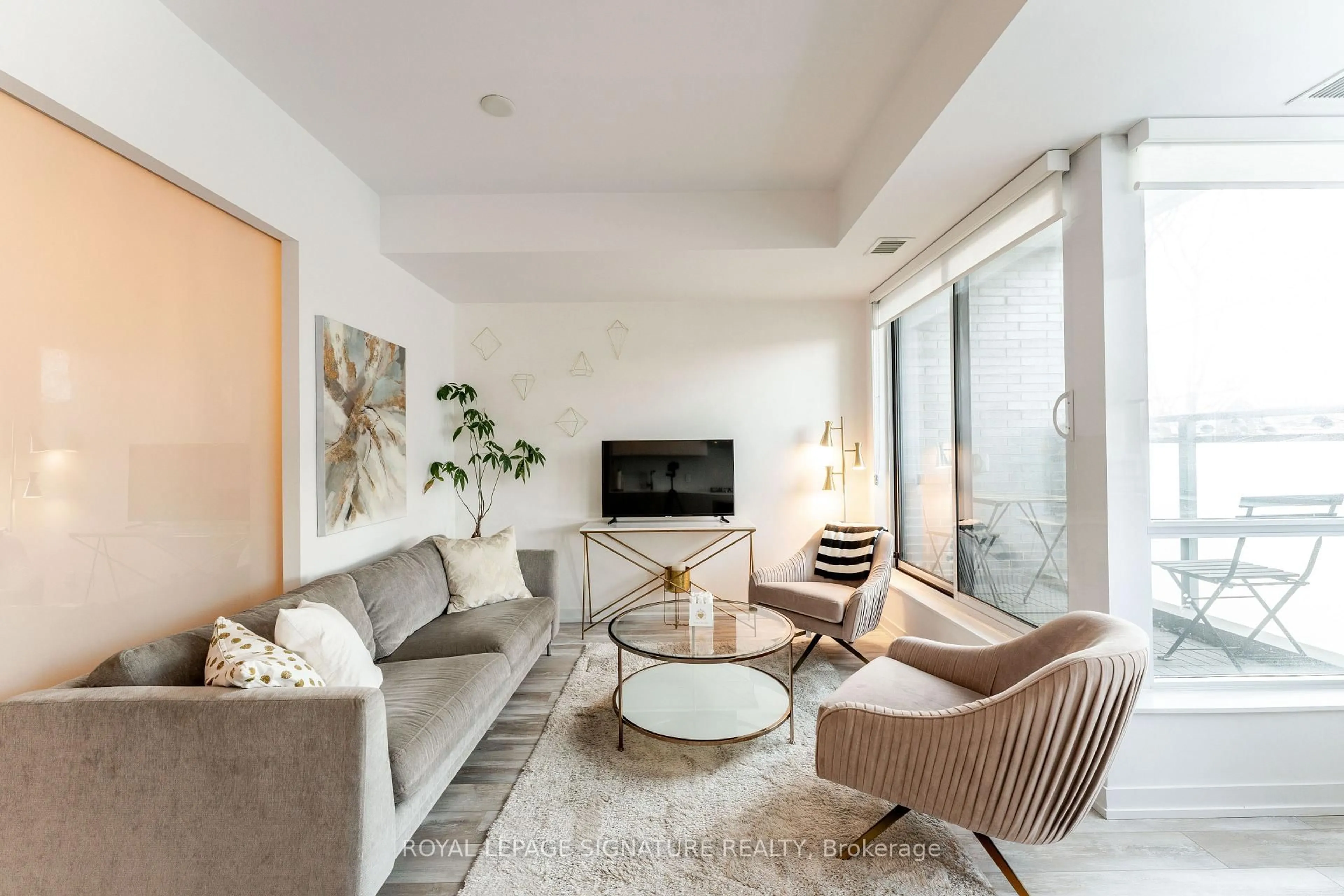 Living room with furniture, unknown for 38 Howard Park Ave #219, Toronto Ontario M6R 0A7